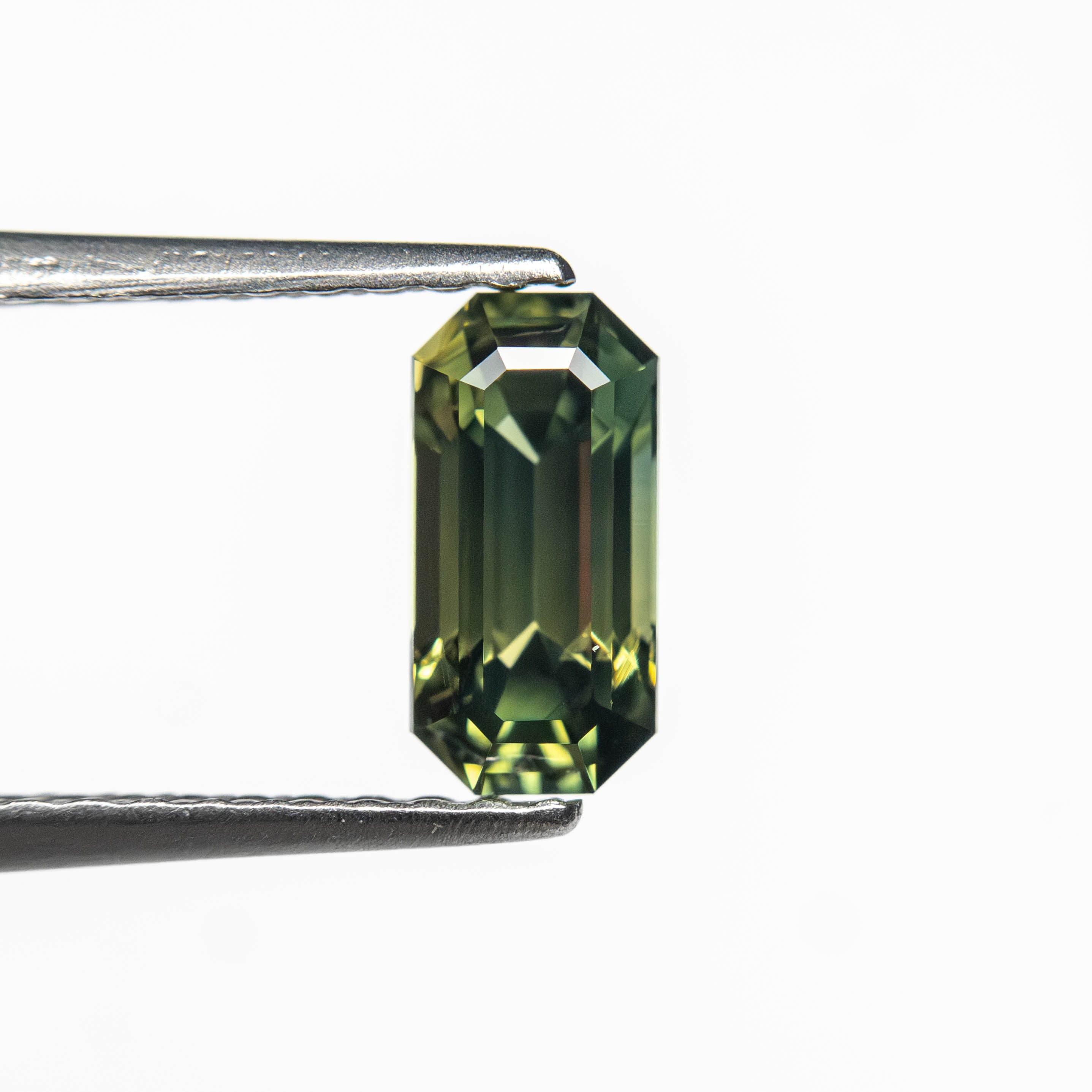 0.82ct 7.16x3.54x3.21mm Cut Corner Rectangle Step Cut Sapphire 27336-51-Staghead Designs
