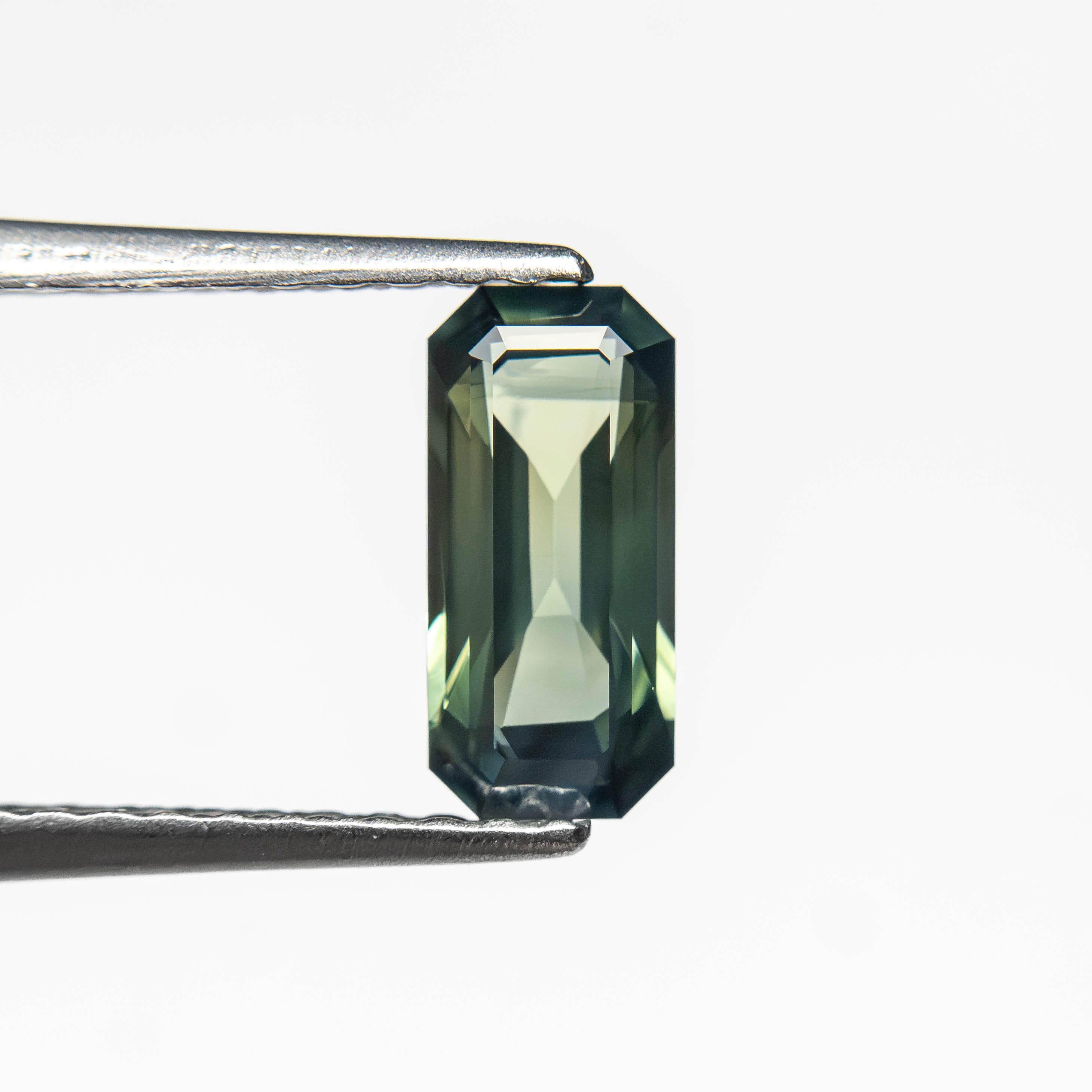 0.71ct 7.78x3.64x2.46mm Cut Corner Rectangle Step Cut Sapphire 27336-53-Staghead Designs
