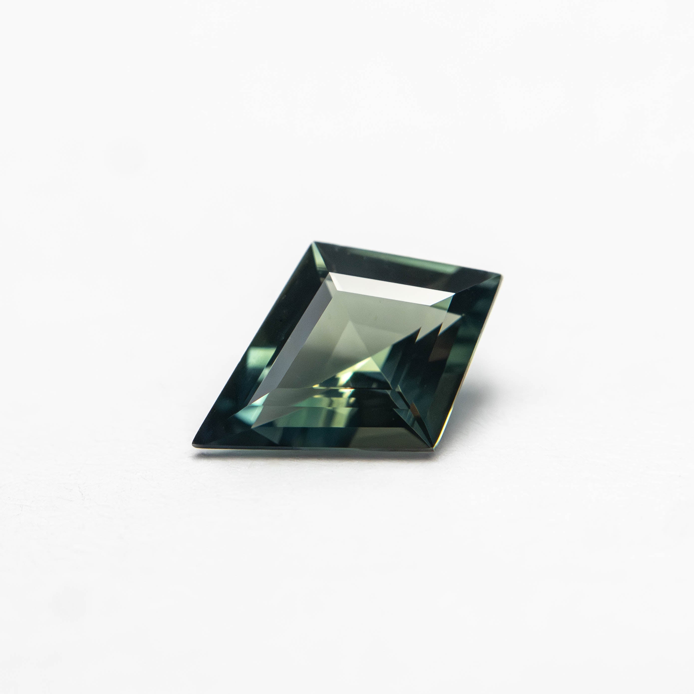 0.54ct 7.68x5.44x2.64mm Kite Step Cut Sapphire 27363-14-Staghead Designs