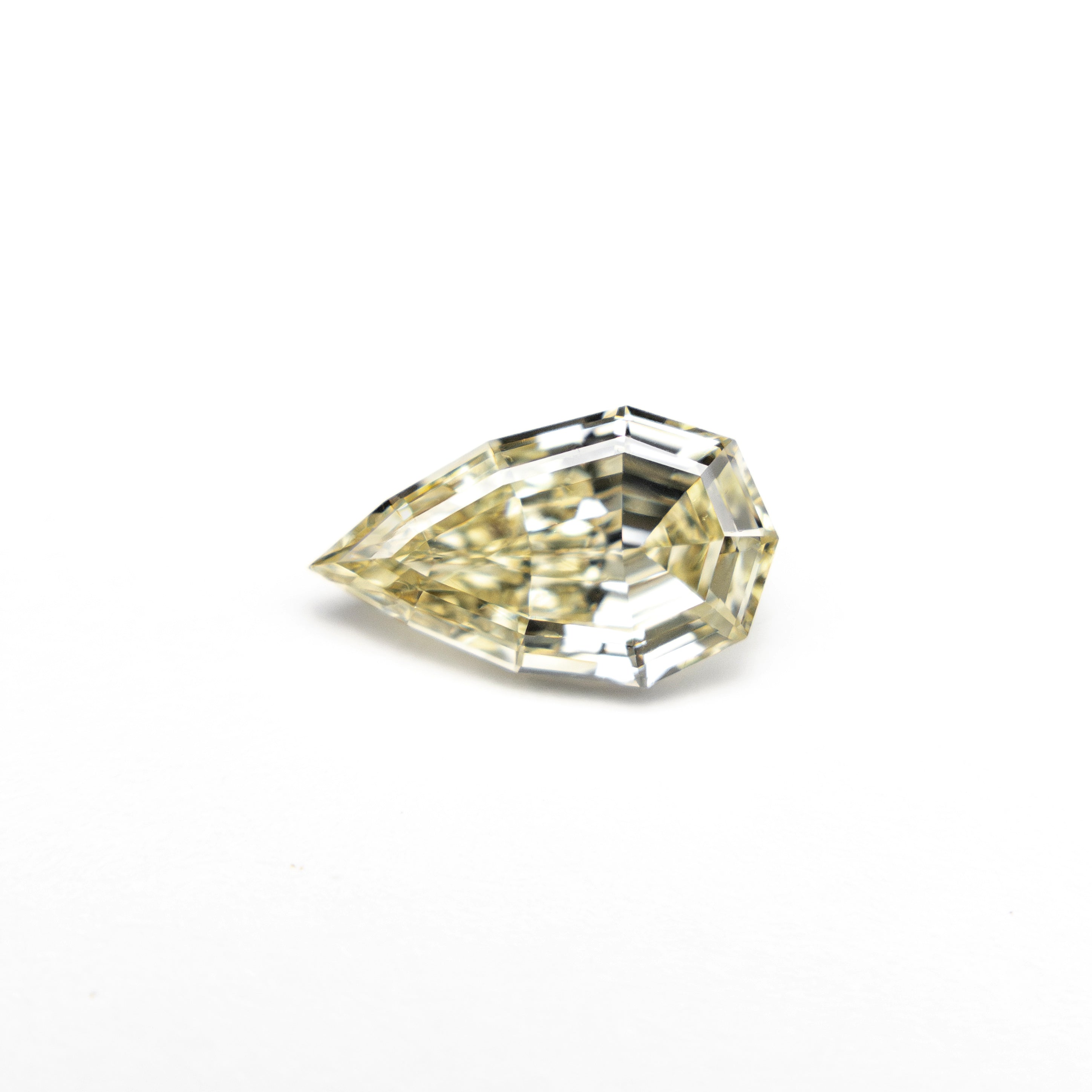 0.63ct 7.73x4.57x2.65mm VS2 C4 Geo Pear Step Cut 🇿🇦 27364-21-Staghead Designs