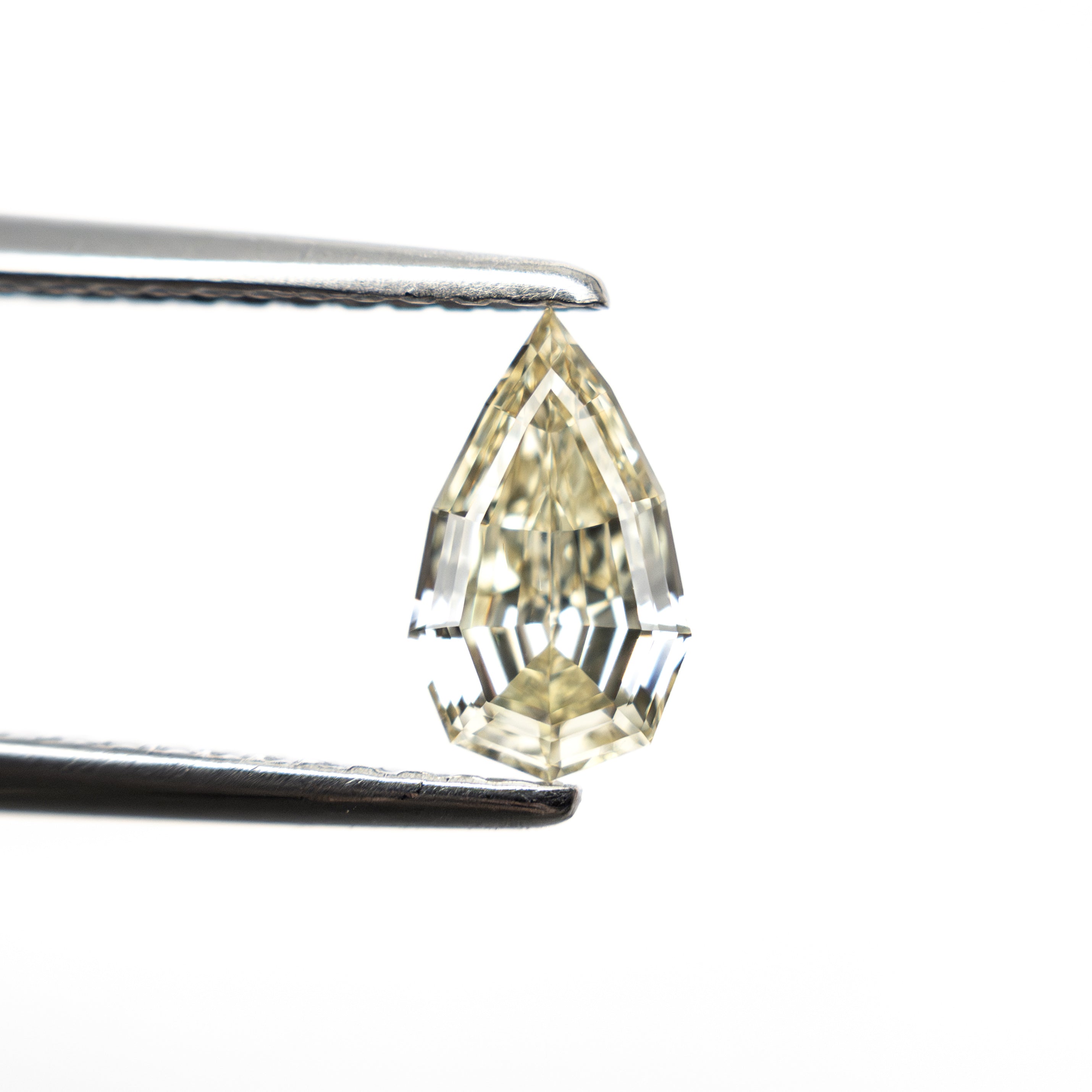 0.63ct 7.73x4.57x2.65mm VS2 C4 Geo Pear Step Cut 🇿🇦 27364-21-Staghead Designs