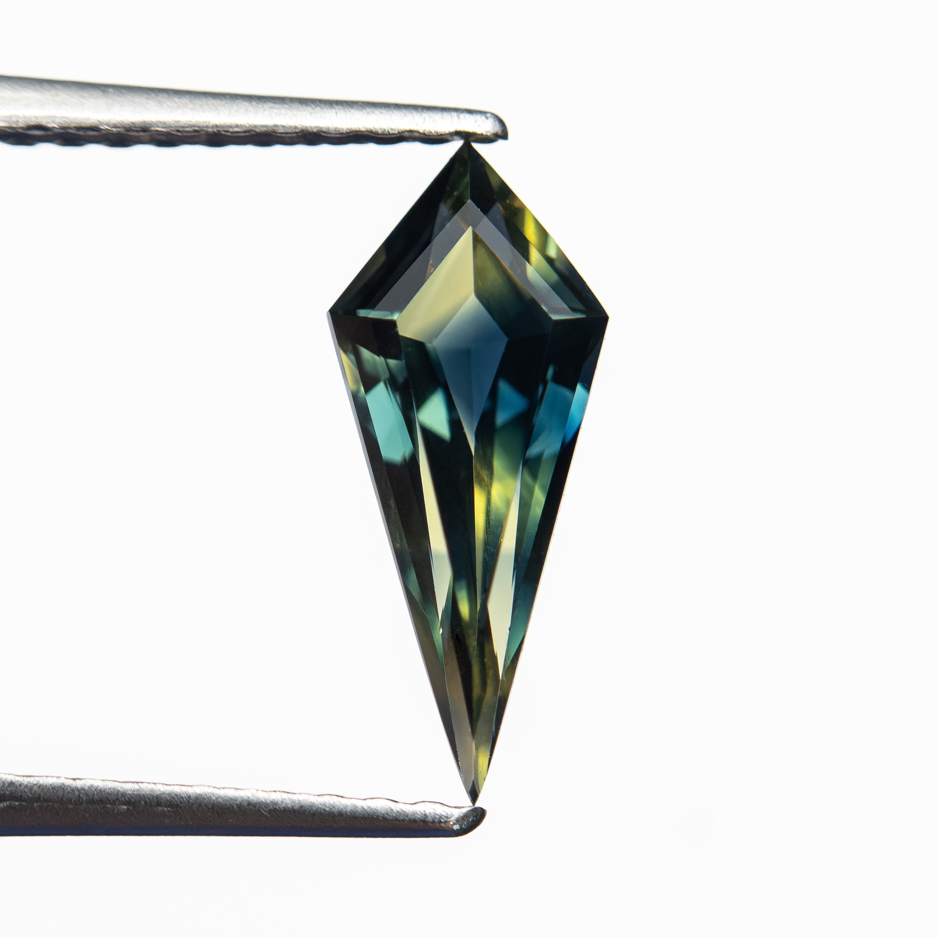0.99ct 11.62x4.92x3.08mm Kite Step Cut Sapphire 27713-01-Staghead Designs