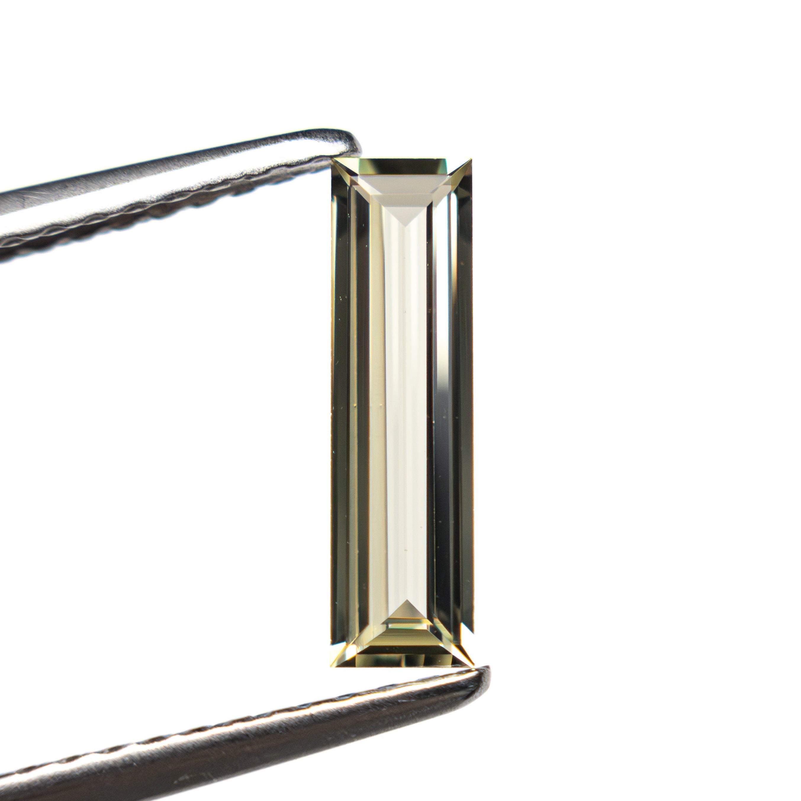 0.62ct 10.53x2.95x1.70mm Baguette Step Cut Sapphire 27719-04-Staghead Designs