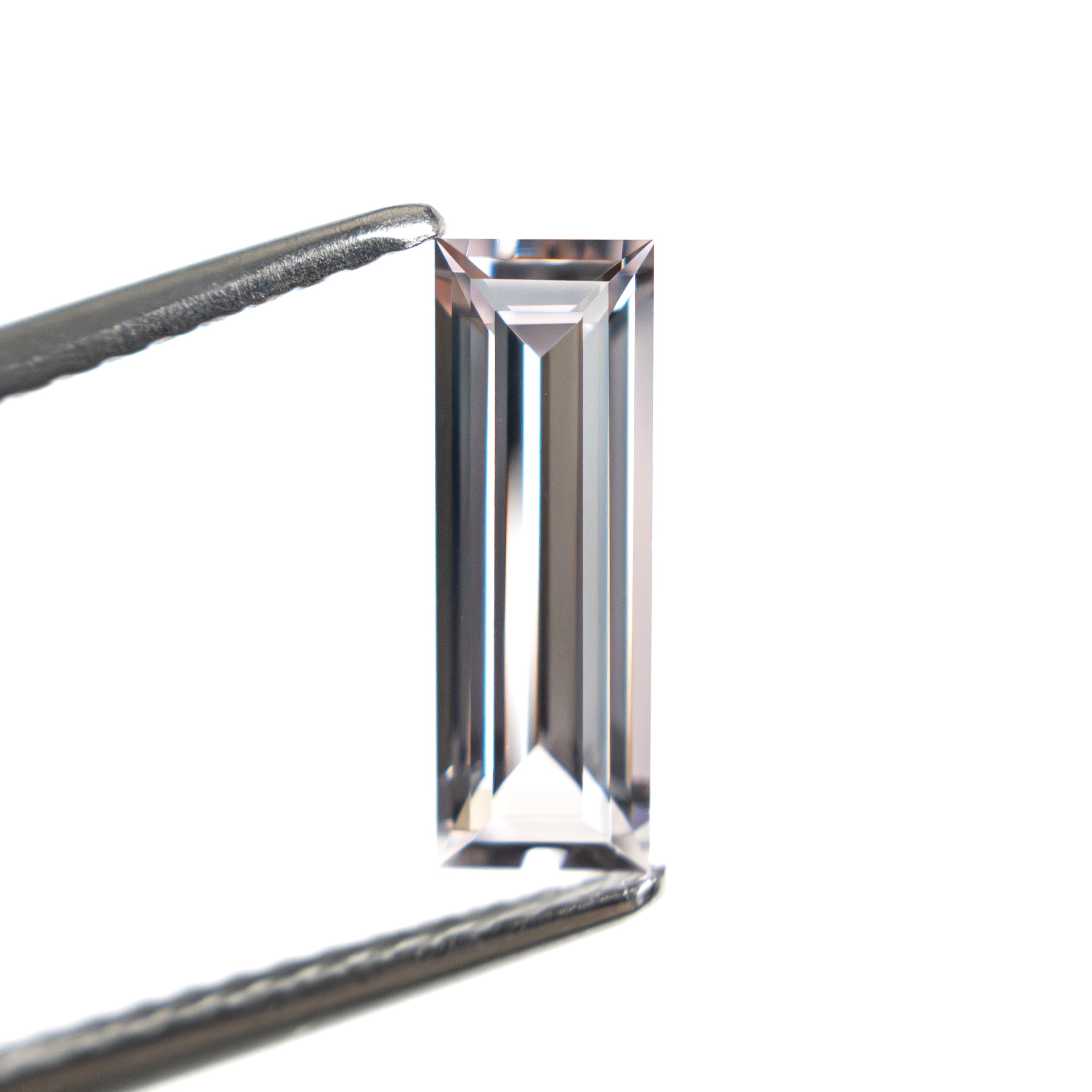 0.91ct 10.30x3.53x2.27mm Baguette Step Cut Sapphire 27720-06-Staghead Designs