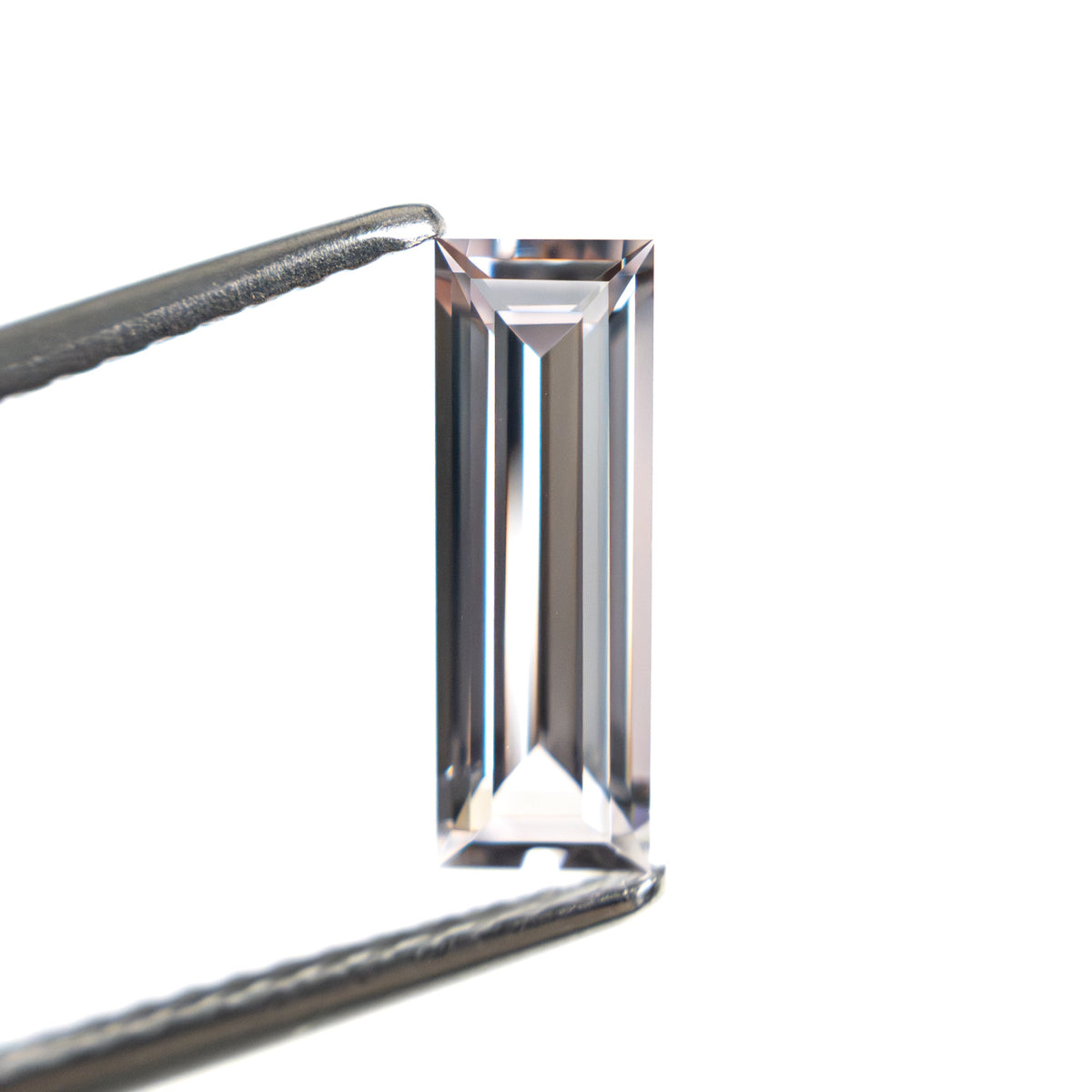 0.91ct 10.30x3.53x2.27mm Baguette Step Cut Sapphire 27720-06-Staghead Designs