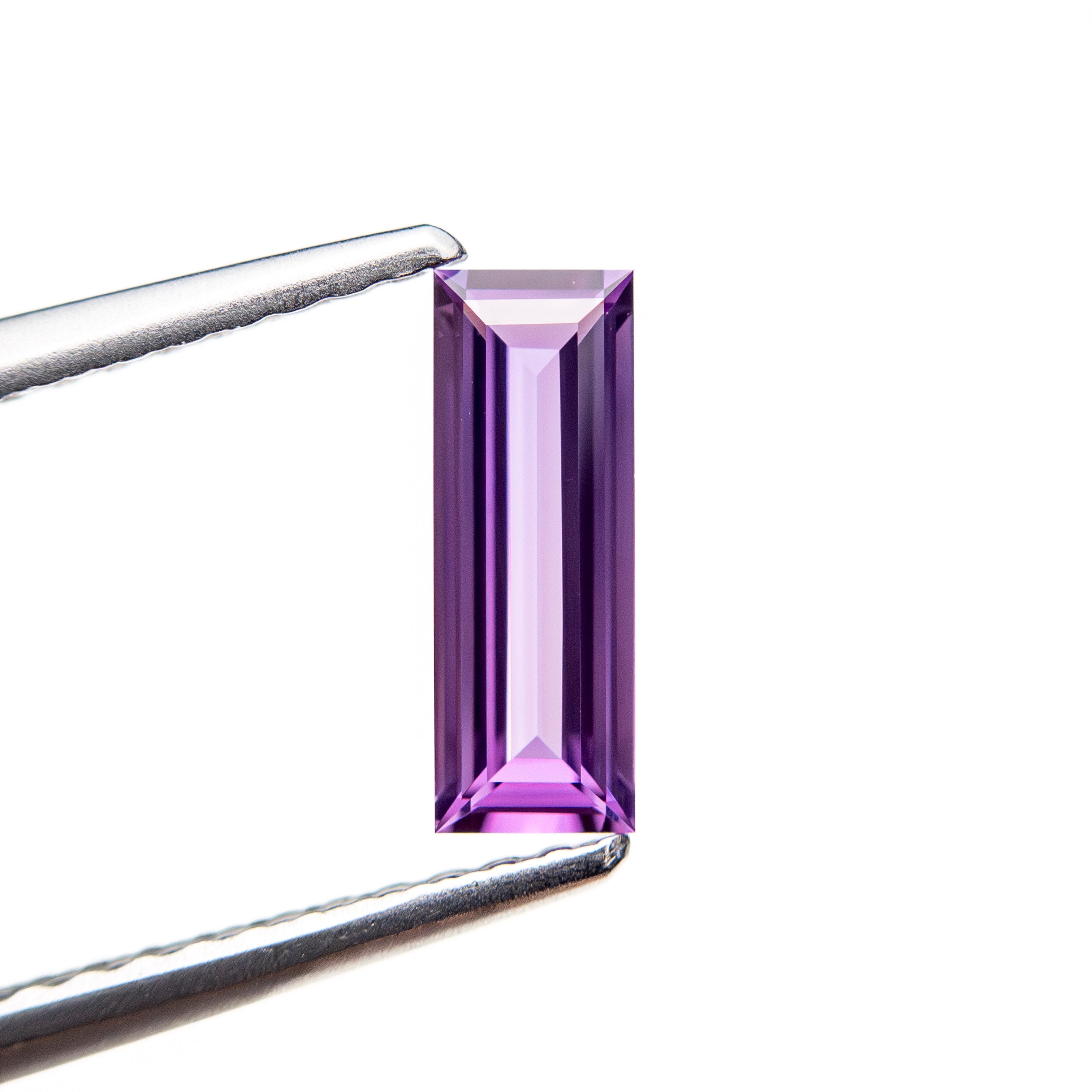 0.51ct 8.53x3.04x1.72mm Baguette Step Cut Sapphire 27721-12