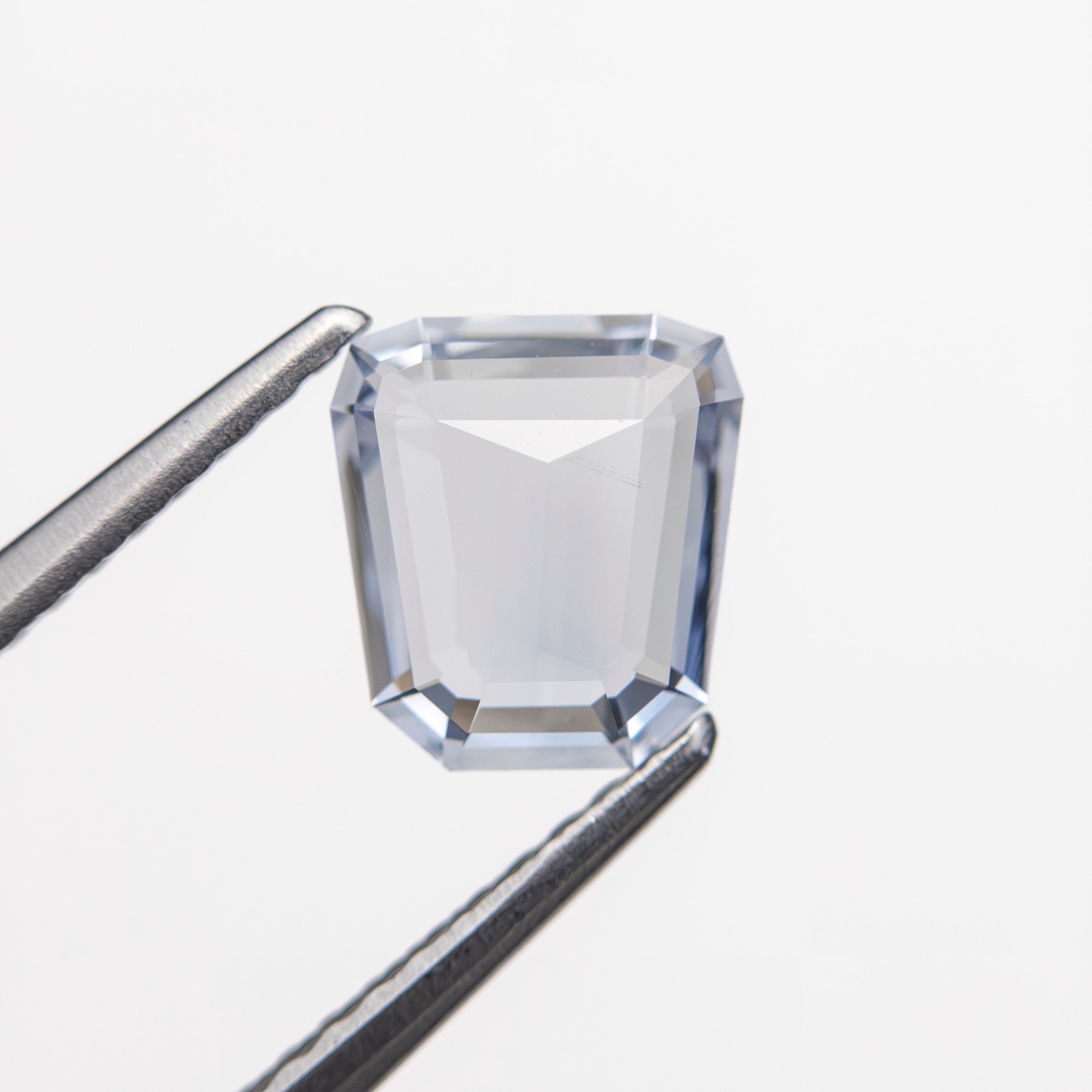 1.12ct 6.95x6.31x2.41mm Trapezoid Step Cut Sapphire 27740-17-Staghead Designs