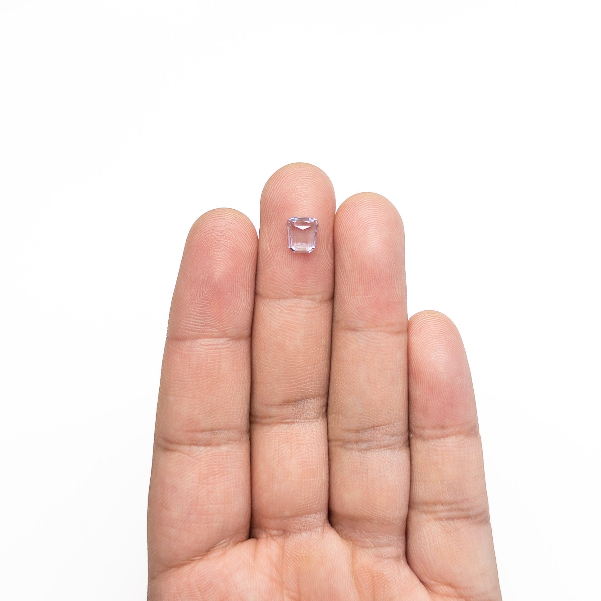1.12ct 6.95x6.31x2.41mm Trapezoid Step Cut Sapphire 27740-17-Staghead Designs