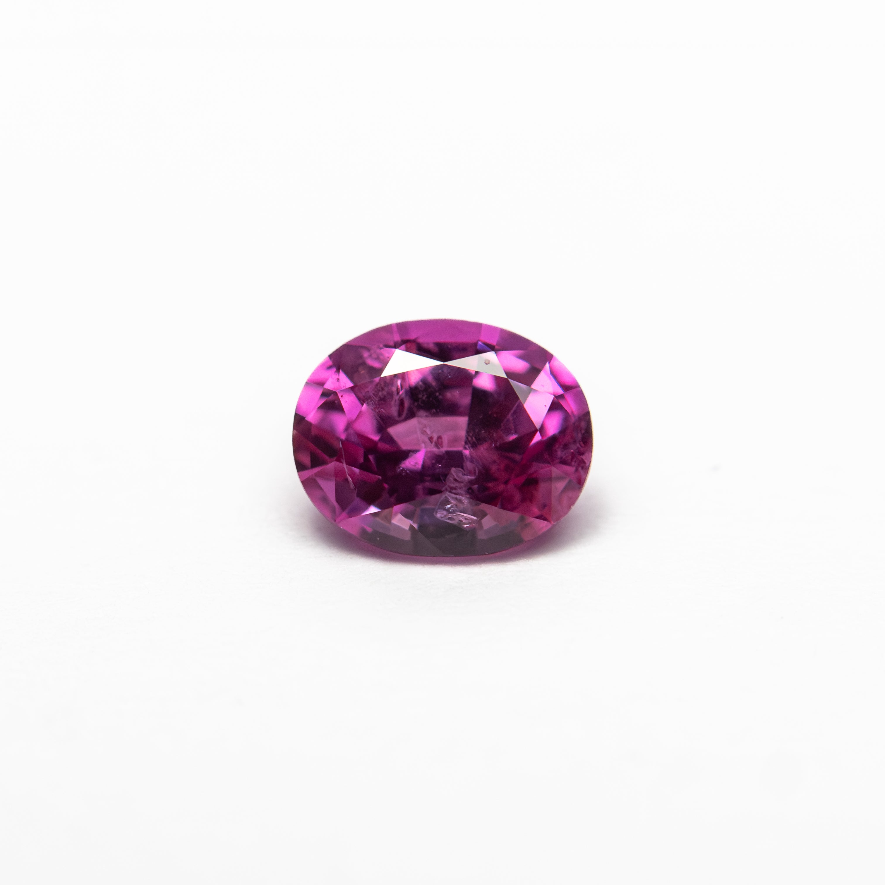 0.59ct 5.58x4.44x2.98mm Oval Brilliant Sapphire 27956-13-Staghead Designs
