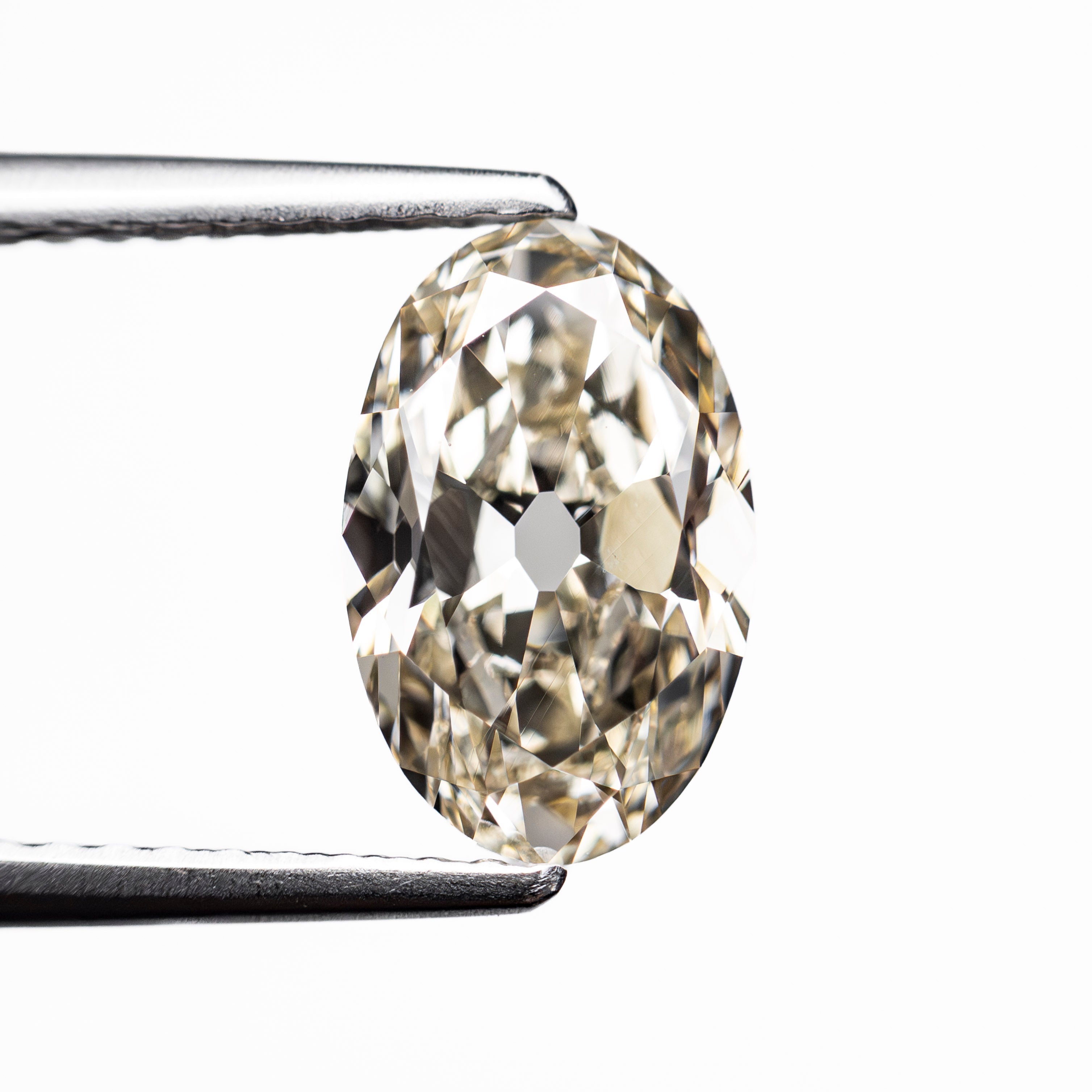 1.67ct 9.84x6.26x3.63mm GIA VS2 M Modern Antique Oval Brilliant 28039-01