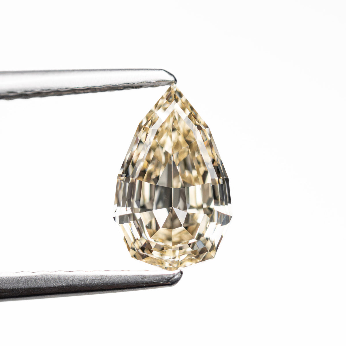 1.36ct 9.10x5.68x3.65mm VS1 Fancy Light Yellowish Brown Geo Pear Step Cut 28045-01-Staghead Designs