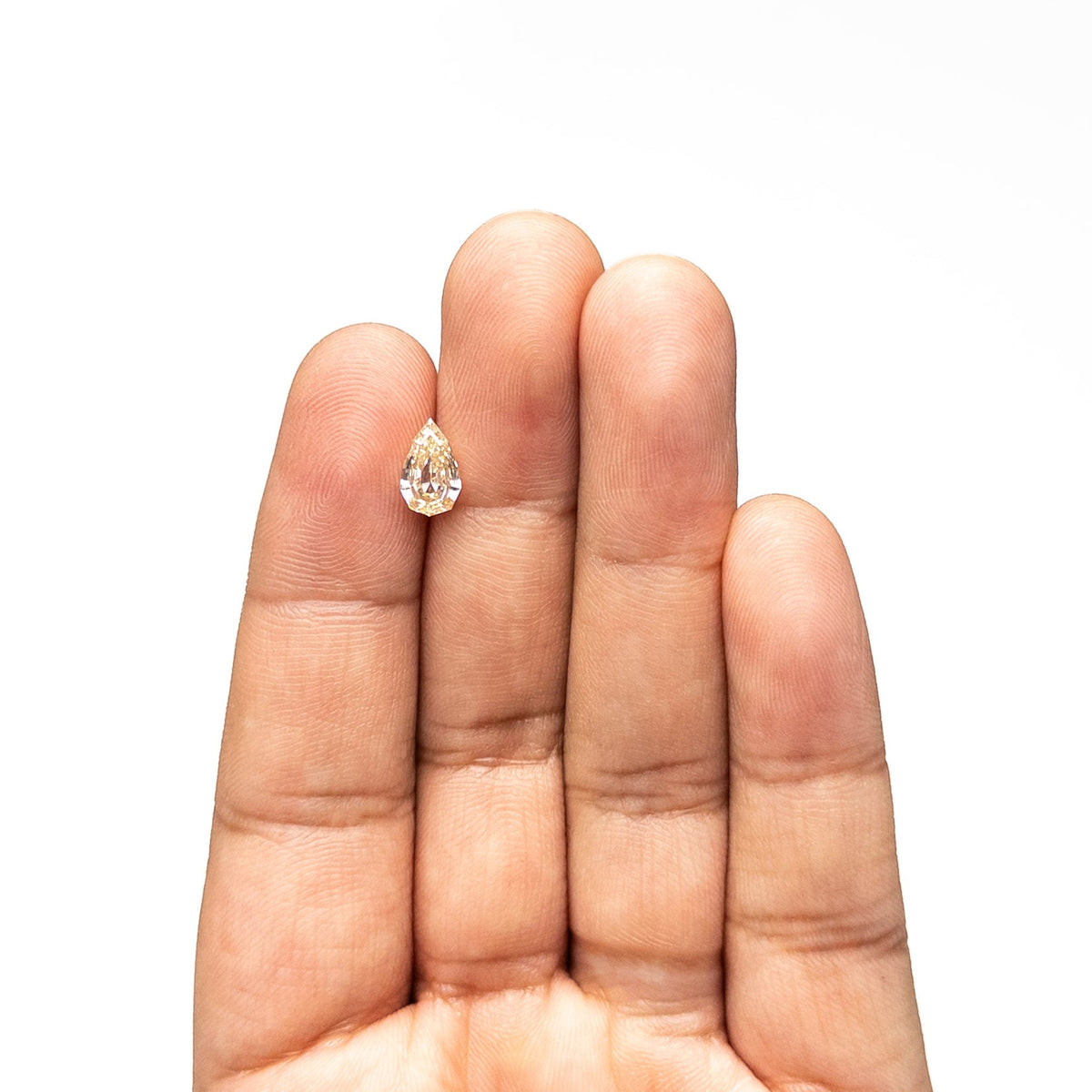1.36ct 9.10x5.68x3.65mm VS1 Fancy Light Yellowish Brown Geo Pear Step Cut 28045-01-Staghead Designs