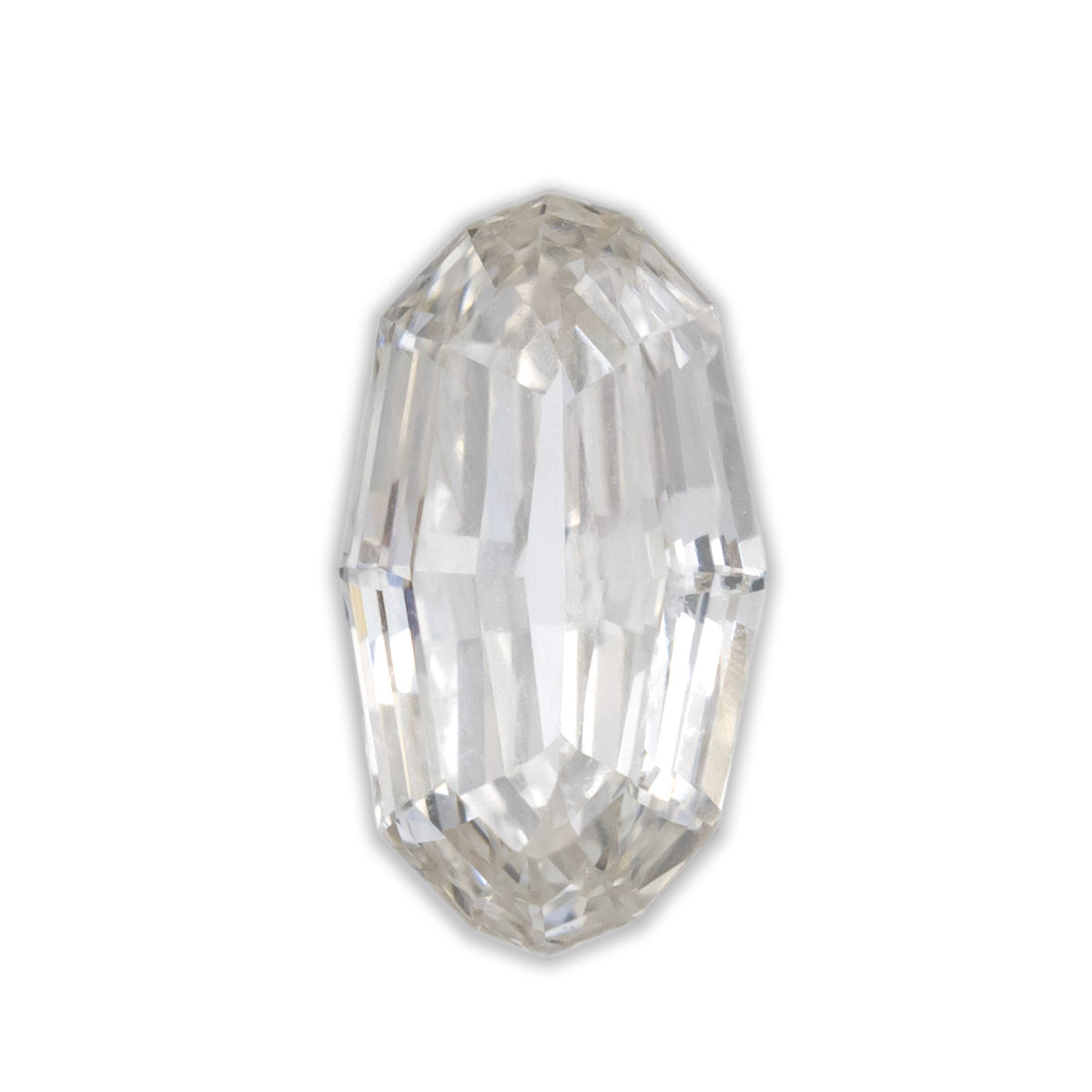 An oval cut champagne diamond on a white background