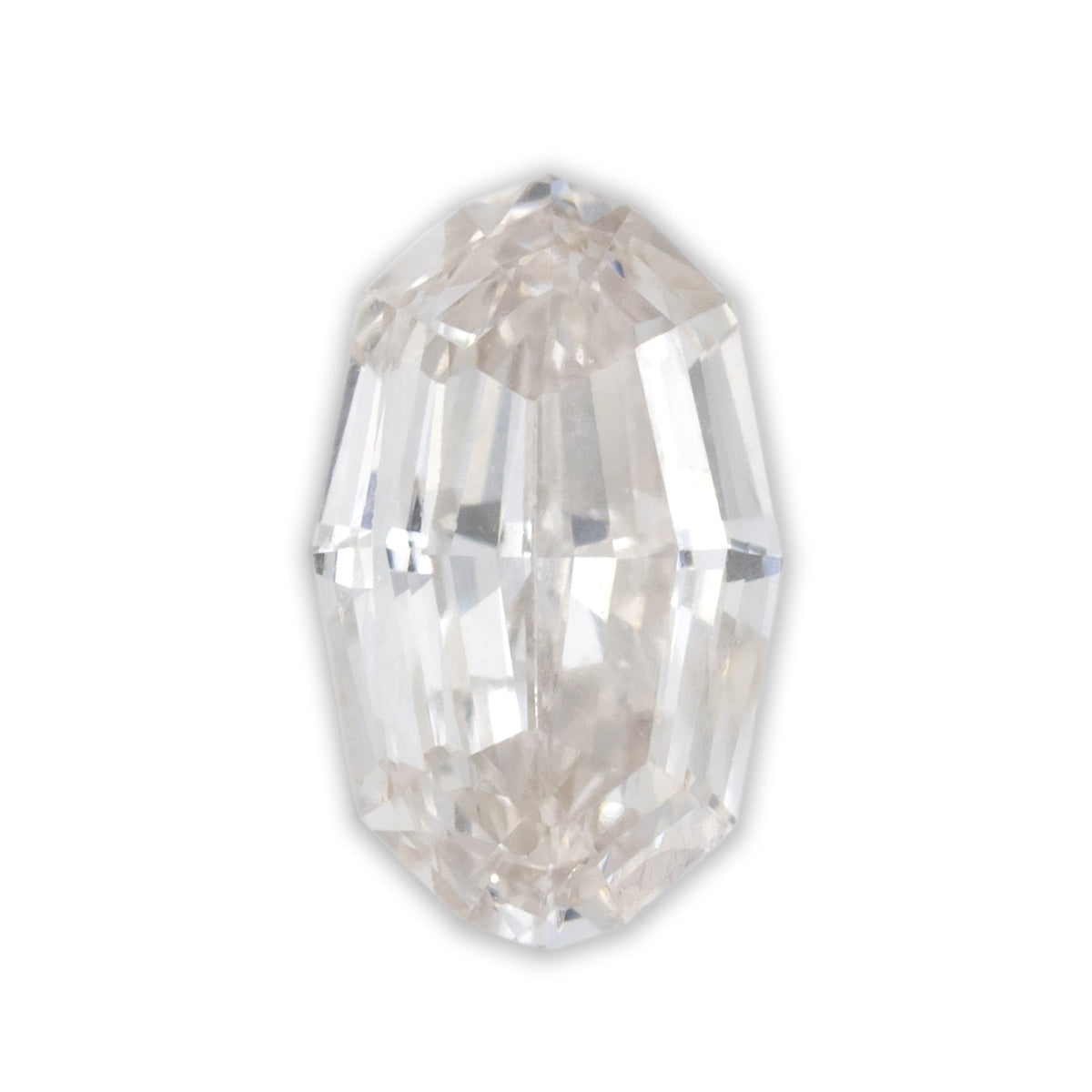 An oval cut diamond on a white background