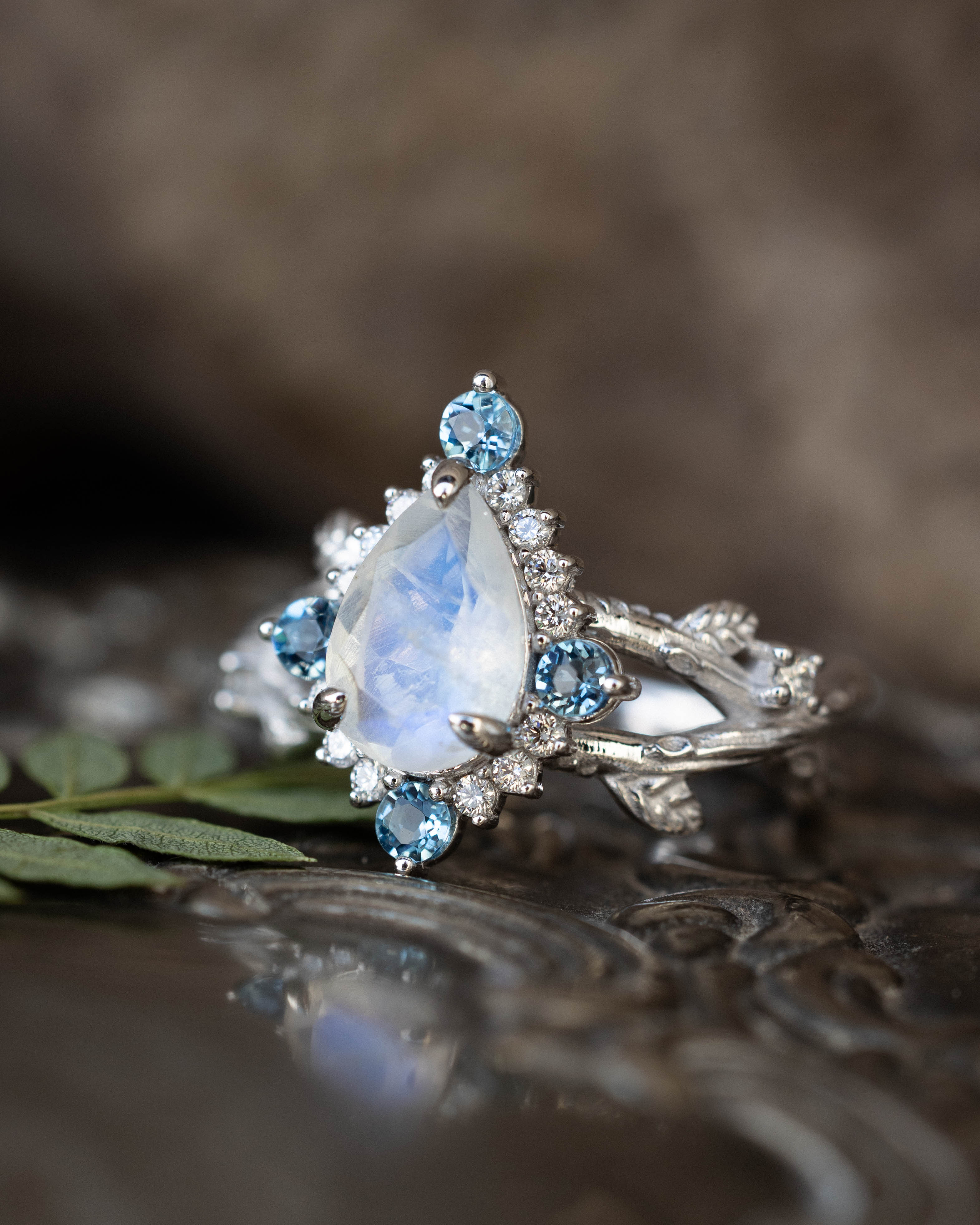 "ARTEMIS ON THE VINE DIVINE" - PEAR CUT MOONSTONE ENGAGEMENT RING WITH DIAMOND & AQUAMARINE ACCENTS IN A BRANCH-STYLE BAND-Staghead Designs