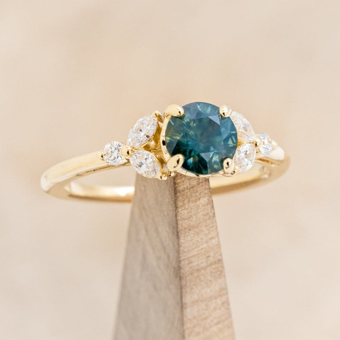 "BLOSSOM" - ROUND CUT MONTANA SAPPHIRE ENGAGEMENT RING WITH LEAF-SHAPED DIAMOND ACCENTS-1