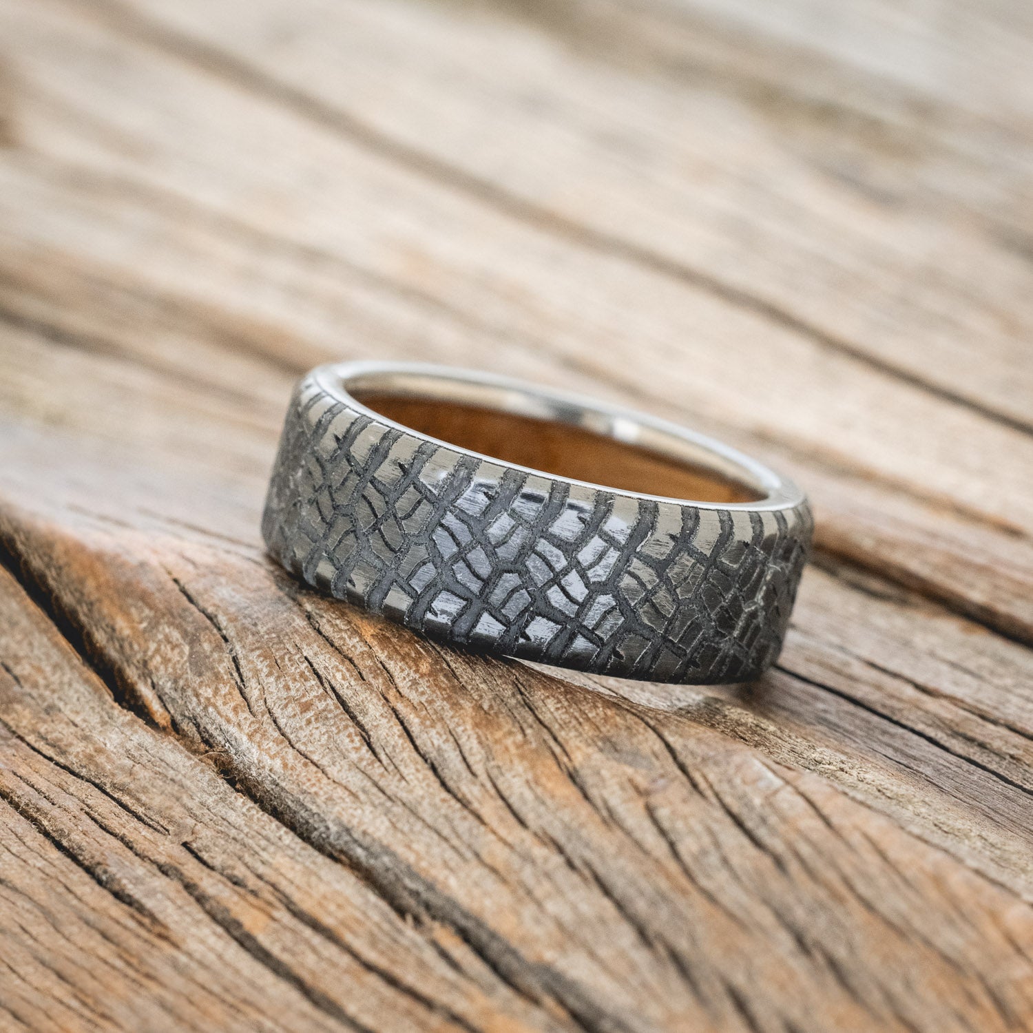 "PARCEL" - CUSTOM EMBOSSED TIRE TREAD WEDDING RING WITH A WHISKEY BARREL LINING-2