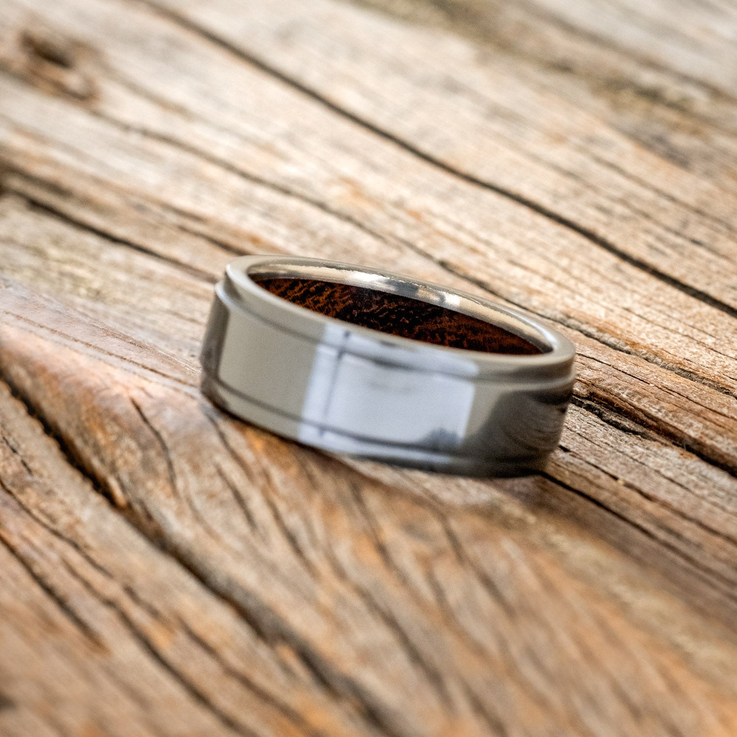 "SEDONA" - RAISED CENTER WEDDING RING WITH AN IRONWOOD LINED BAND-11