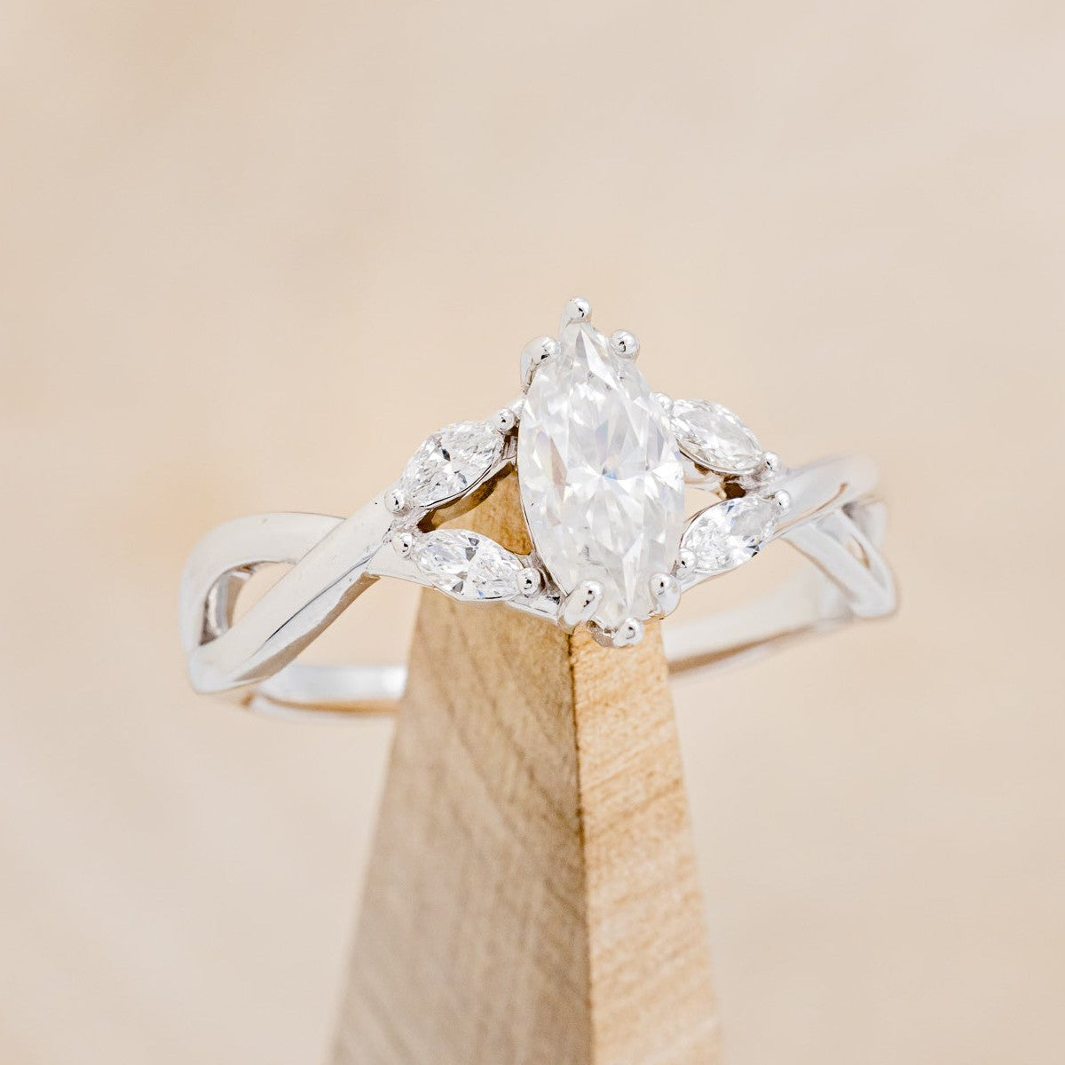 "ELECTA" - MARQUISE MOISSANITE ENGAGEMENT RING WITH DIAMOND ACCENTS-1