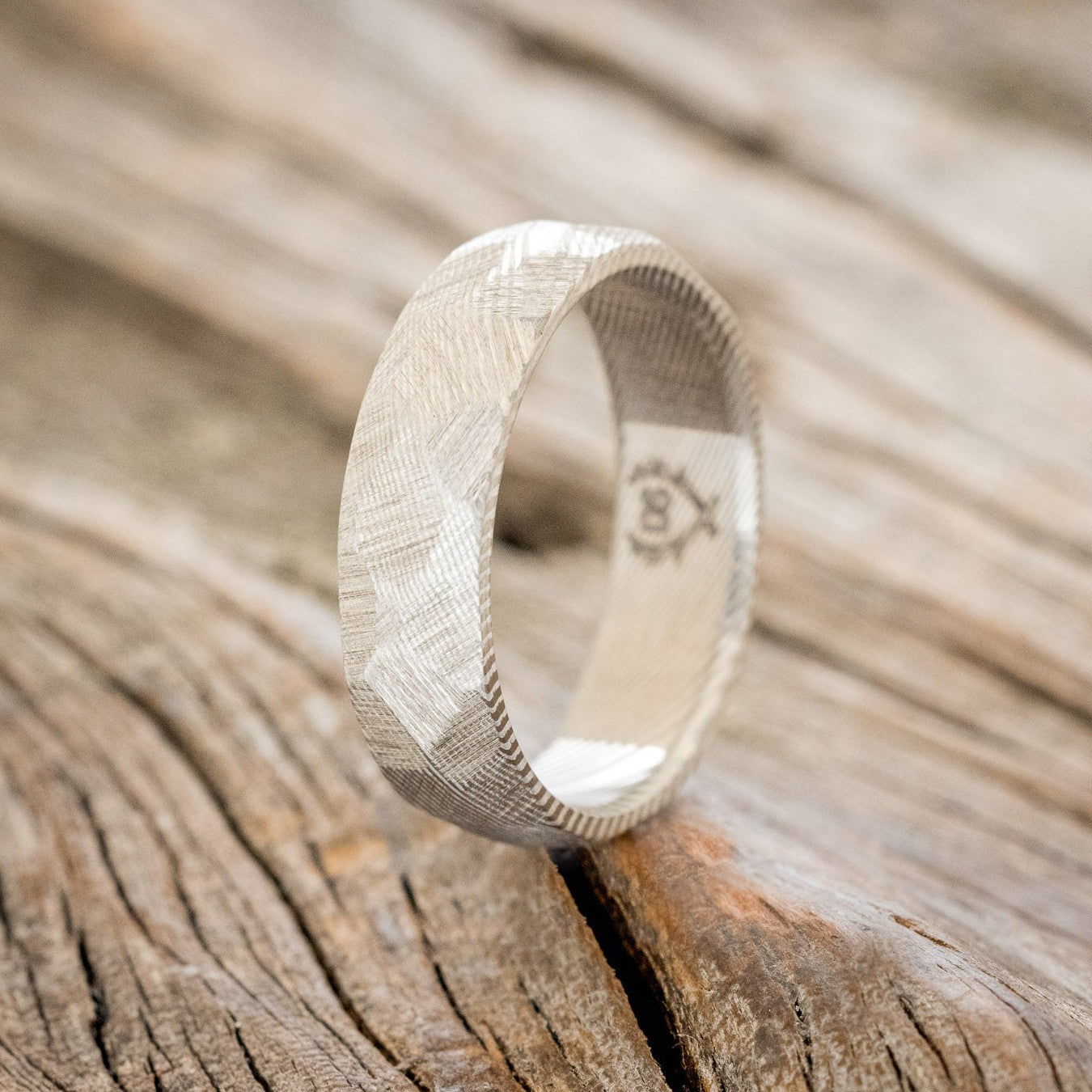 FACETED DAMASCUS STEEL WEDDING BAND