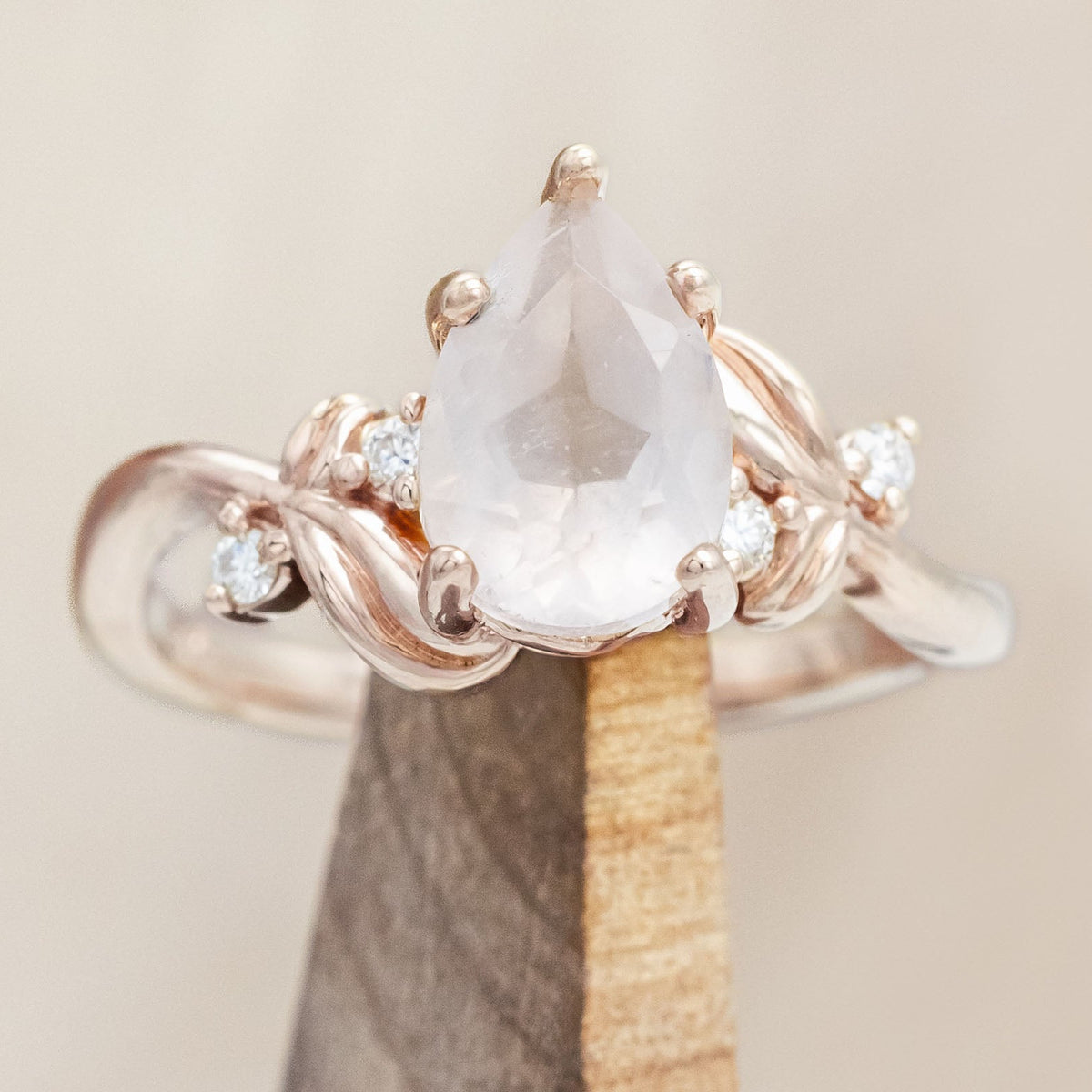"GLADYS" - PEAR CUT ENGAGEMENT RING WITH DIAMOND ACCENTS ON A FLORAL-STYLE BAND-Staghead Designs