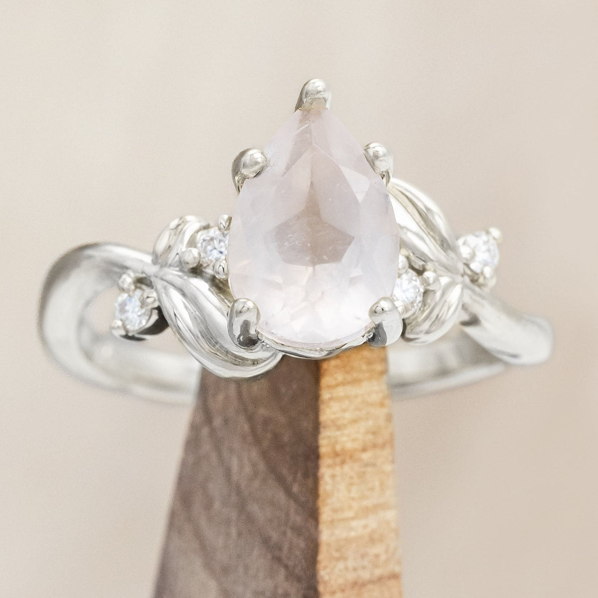 "GLADYS" - PEAR CUT ENGAGEMENT RING WITH DIAMOND ACCENTS ON A FLORAL-STYLE BAND-Staghead Designs