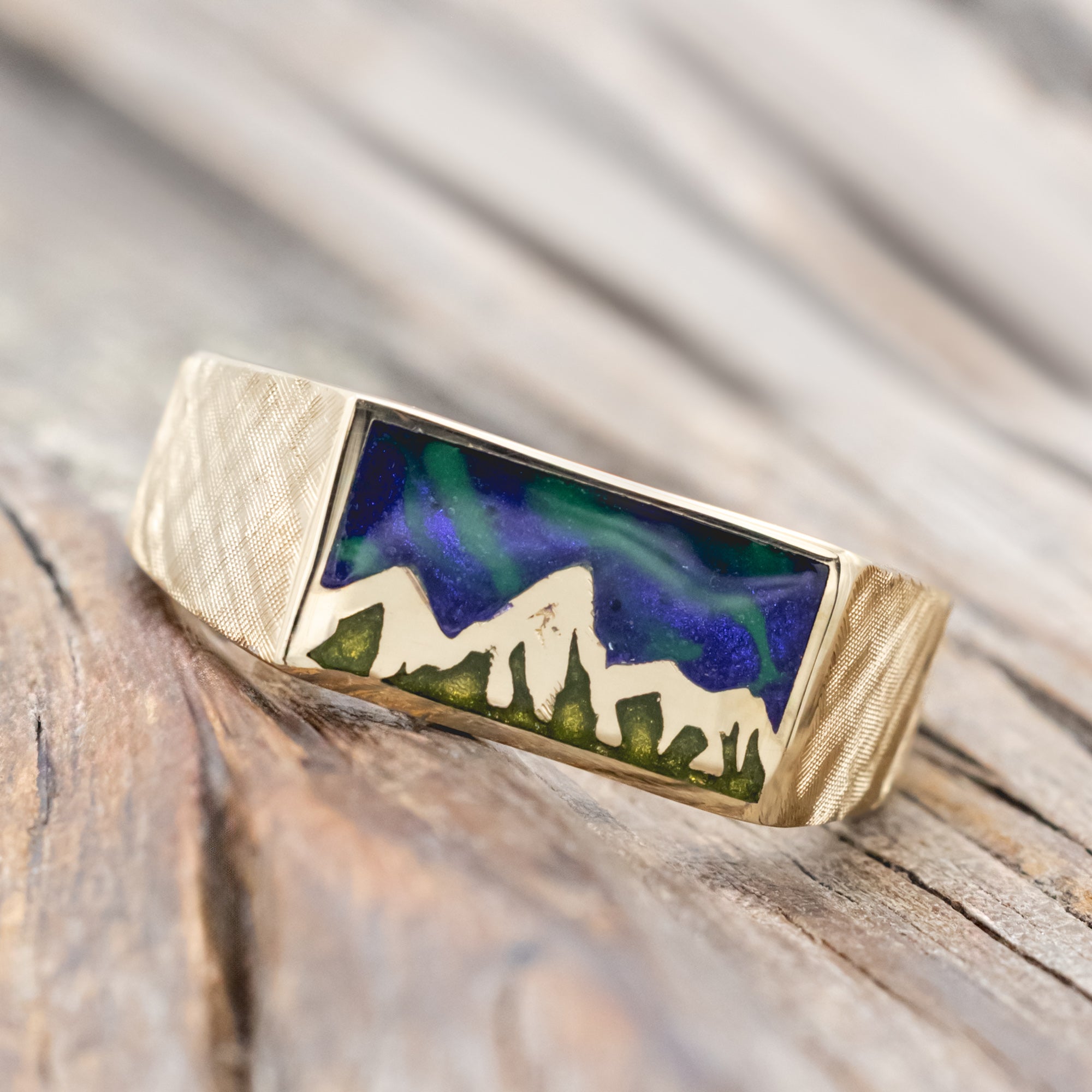 "ATLAS" - MOUNTAIN ENGRAVED WEDDING BAND WITH GLOW IN THE DARK NORTHERN LIGHTS, A MYSTIC MOSS INLAY, AND A FLORENTINE FINISH-Staghead Designs