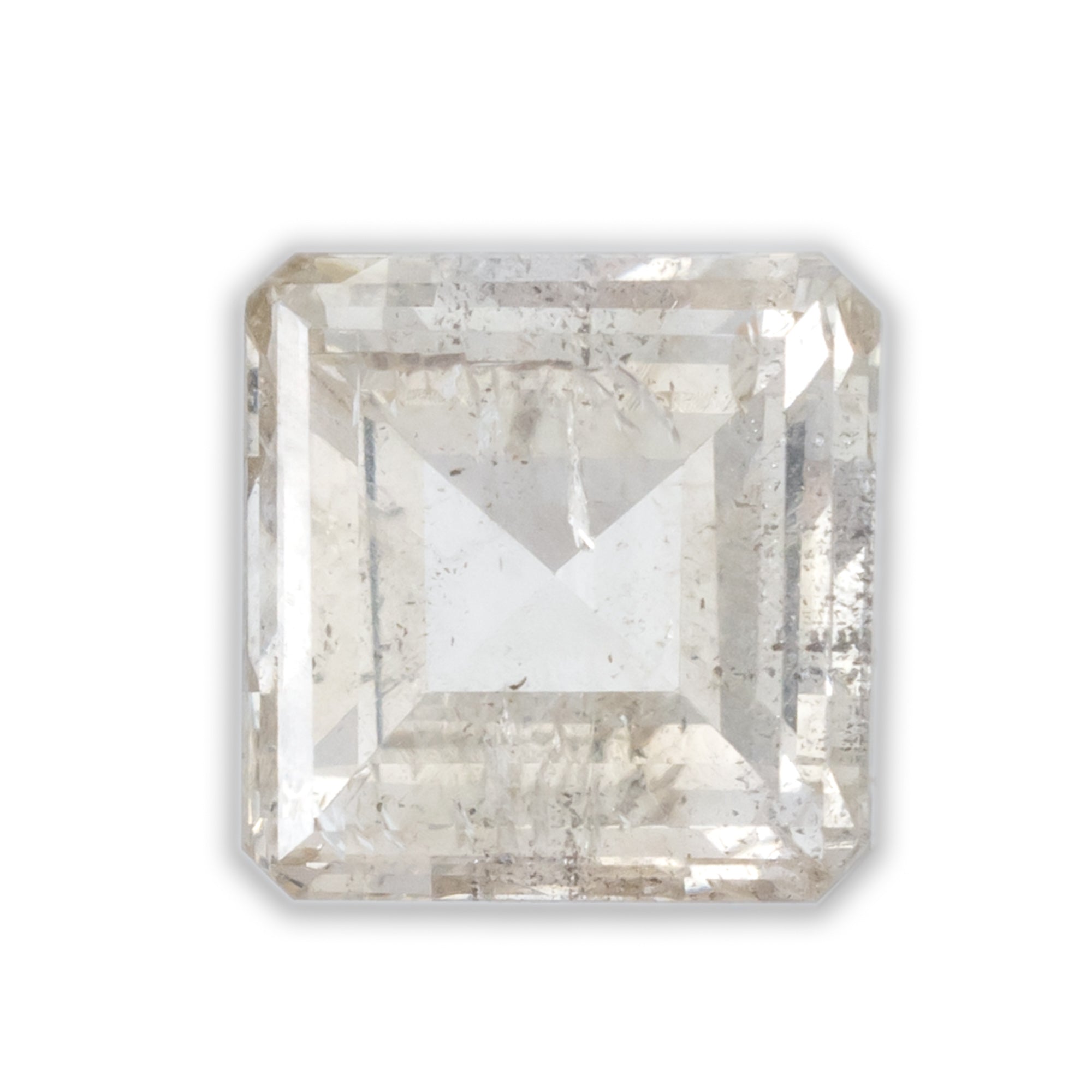 Square cut champagne diamond on a white background.
