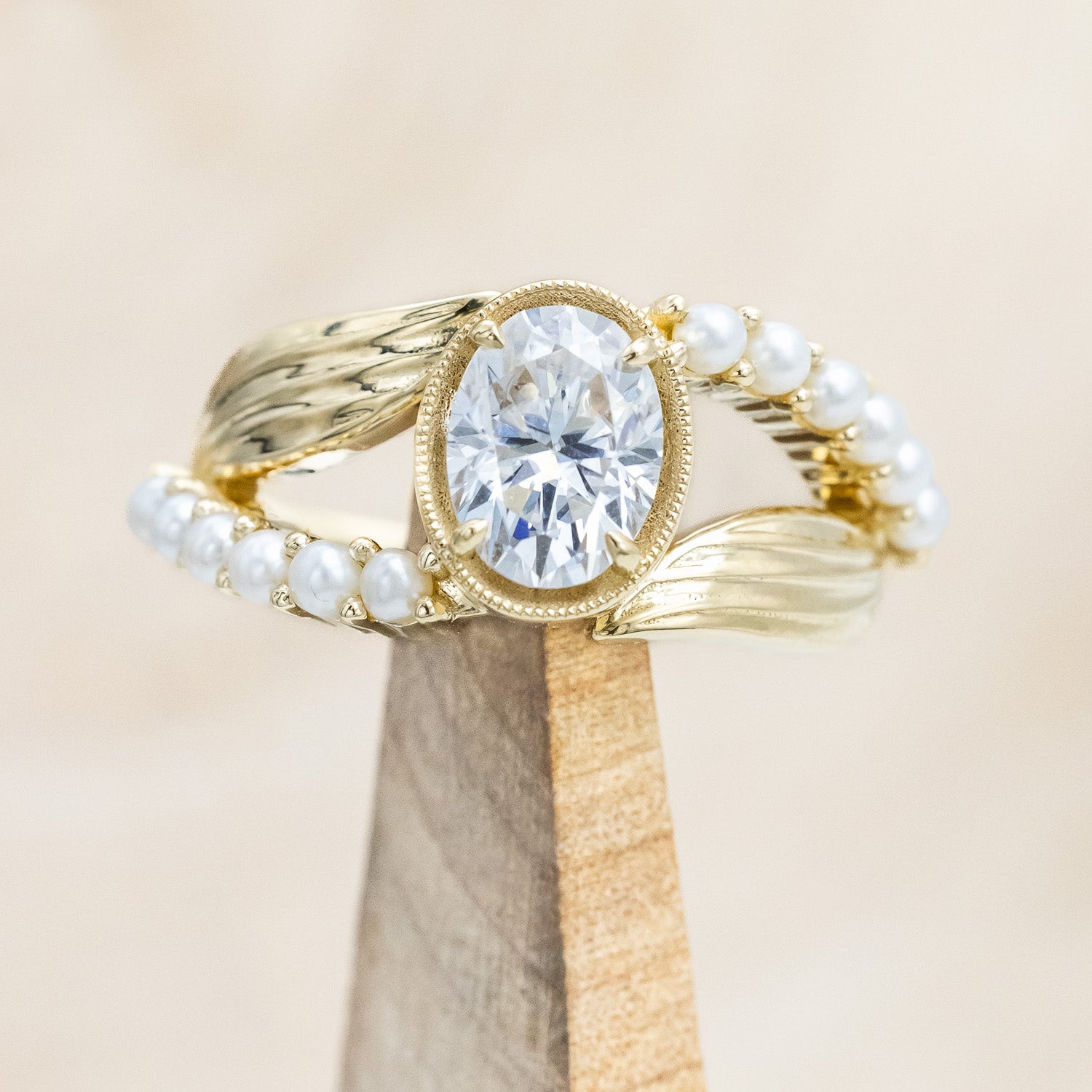 "Lily" an oval cut moissanite women's engagement ring with pearl accents