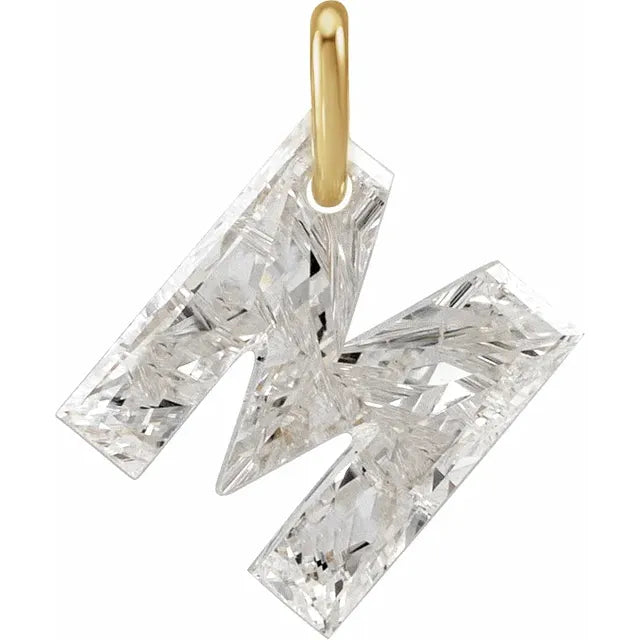 Diamond pendant shaped like the letter 'M' on a white background