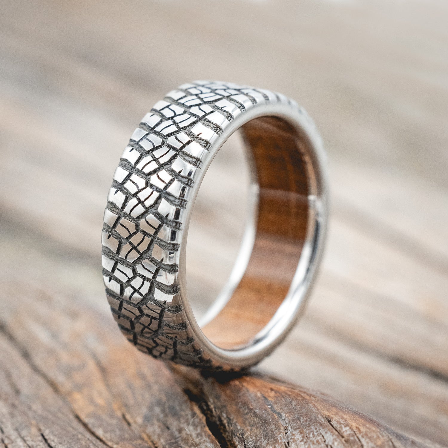 "PARCEL" - CUSTOM EMBOSSED TIRE TREAD WEDDING RING WITH A WHISKEY BARREL LINING-Staghead Designs