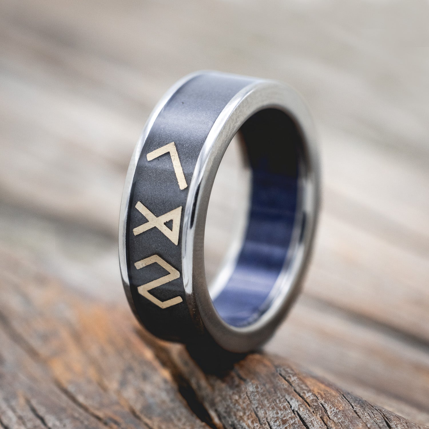 "RAINIER" - WEDDING BAND FEATURING 14K GOLD NORDIC SYMBOLS WITH A SANDBLASTED BACKGROUND AND A BLUE GOLDSTONE LINING-Staghead Designs