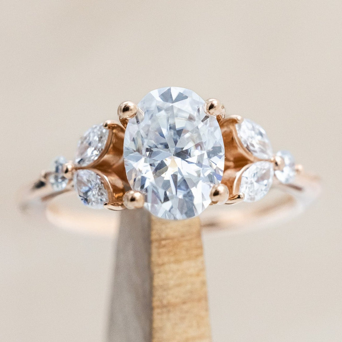 "BLOSSOM" - OVAL MOISSANITE ENGAGEMENT RING WITH LEAF-SHAPED DIAMOND ACCENTS-Staghead Designs