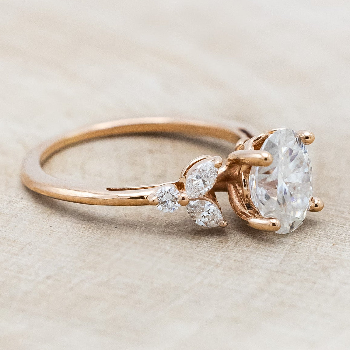 "BLOSSOM" - OVAL MOISSANITE ENGAGEMENT RING WITH LEAF-SHAPED DIAMOND ACCENTS-Staghead Designs