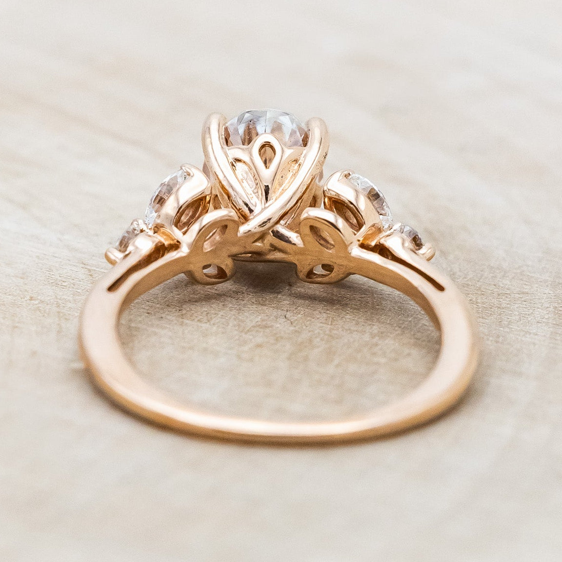 "BLOSSOM" - OVAL MOISSANITE ENGAGEMENT RING WITH LEAF-SHAPED DIAMOND ACCENTS-Staghead Designs