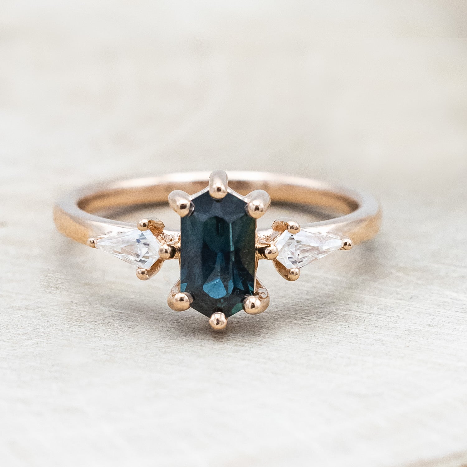 "Isla" - elongated hexagon cut Australian sapphire with moissanite accents in 14K rose gold