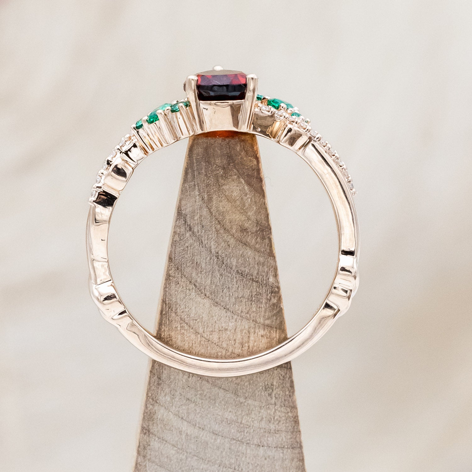 "KAMILA" - PEAR CUT MOZAMBIQUE GARNET ENGAGEMENT RING WITH EMERALD & DIAMOND ACCENTS-Staghead Designs