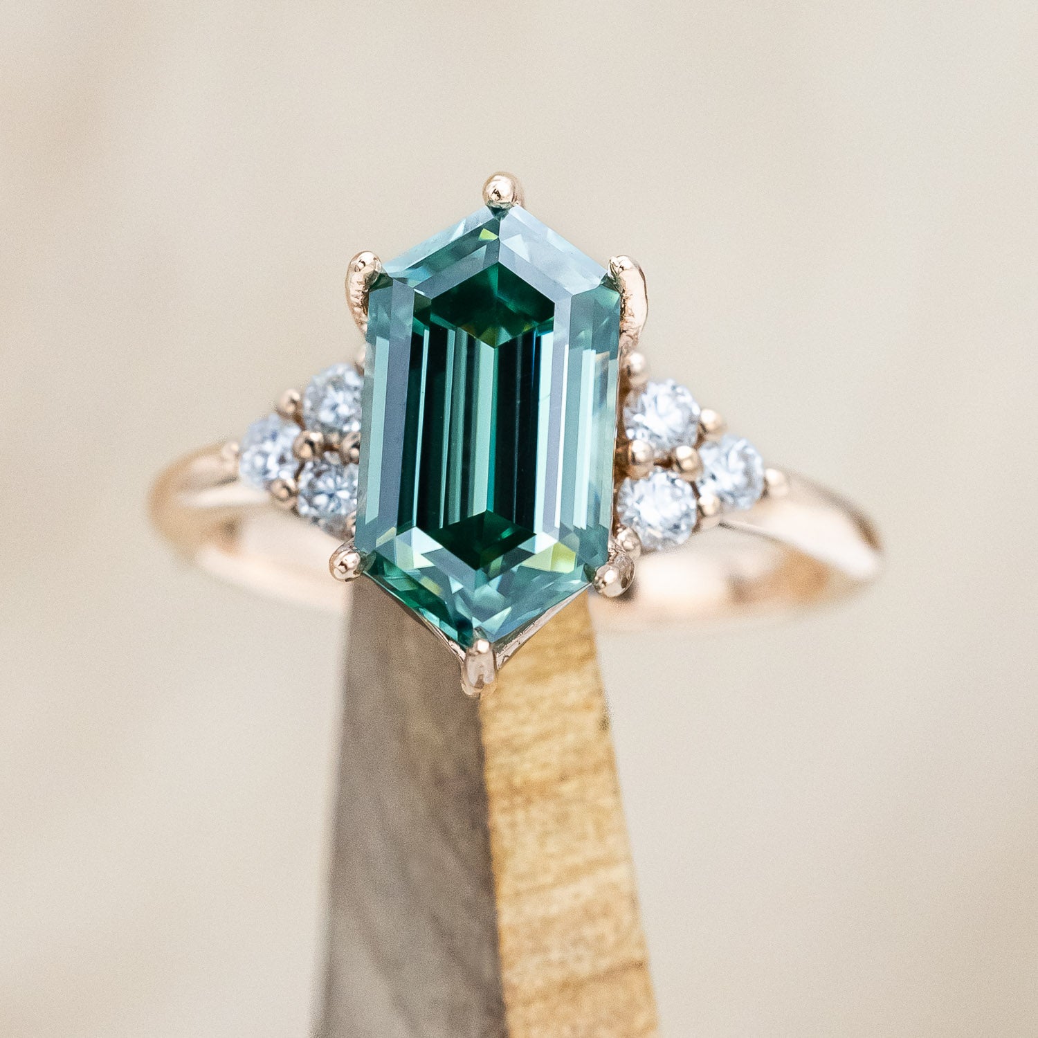 "OCTAVIA" - ELONGATED HEXAGON CUT GREEN MOISSANITE ENGAGEMENT RING WITH DIAMOND ACCENTS-Staghead Designs