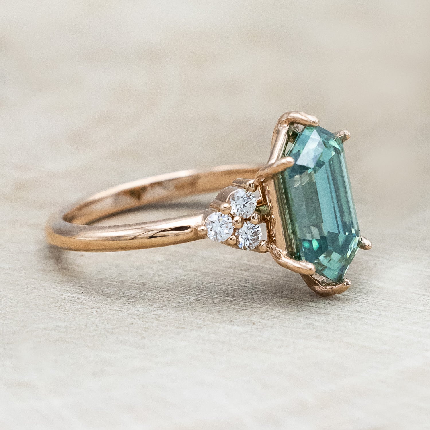 "OCTAVIA" - ELONGATED HEXAGON CUT GREEN MOISSANITE ENGAGEMENT RING WITH DIAMOND ACCENTS-Staghead Designs