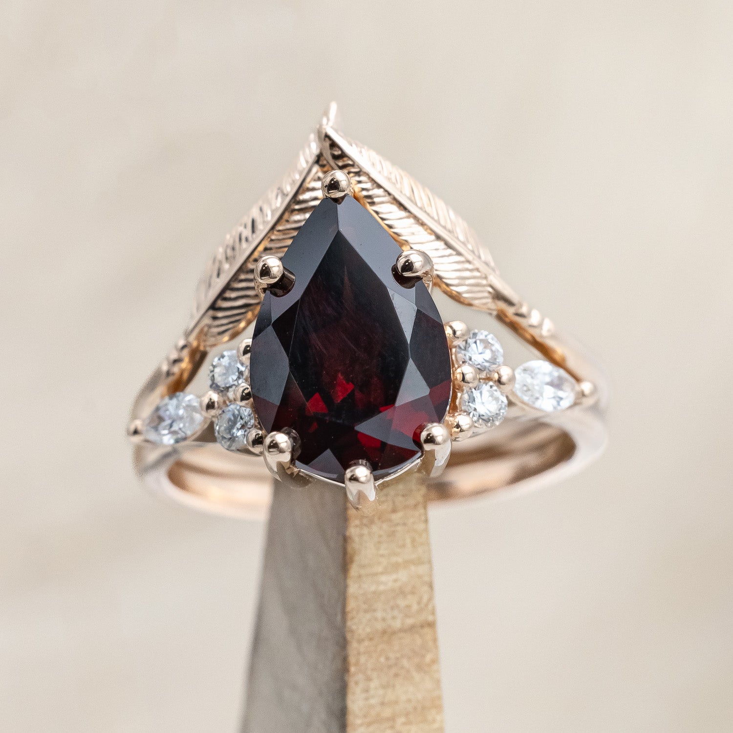 "Sage" - garnet women's engagement ring with diamond accents & "Fala" feather-style tracer