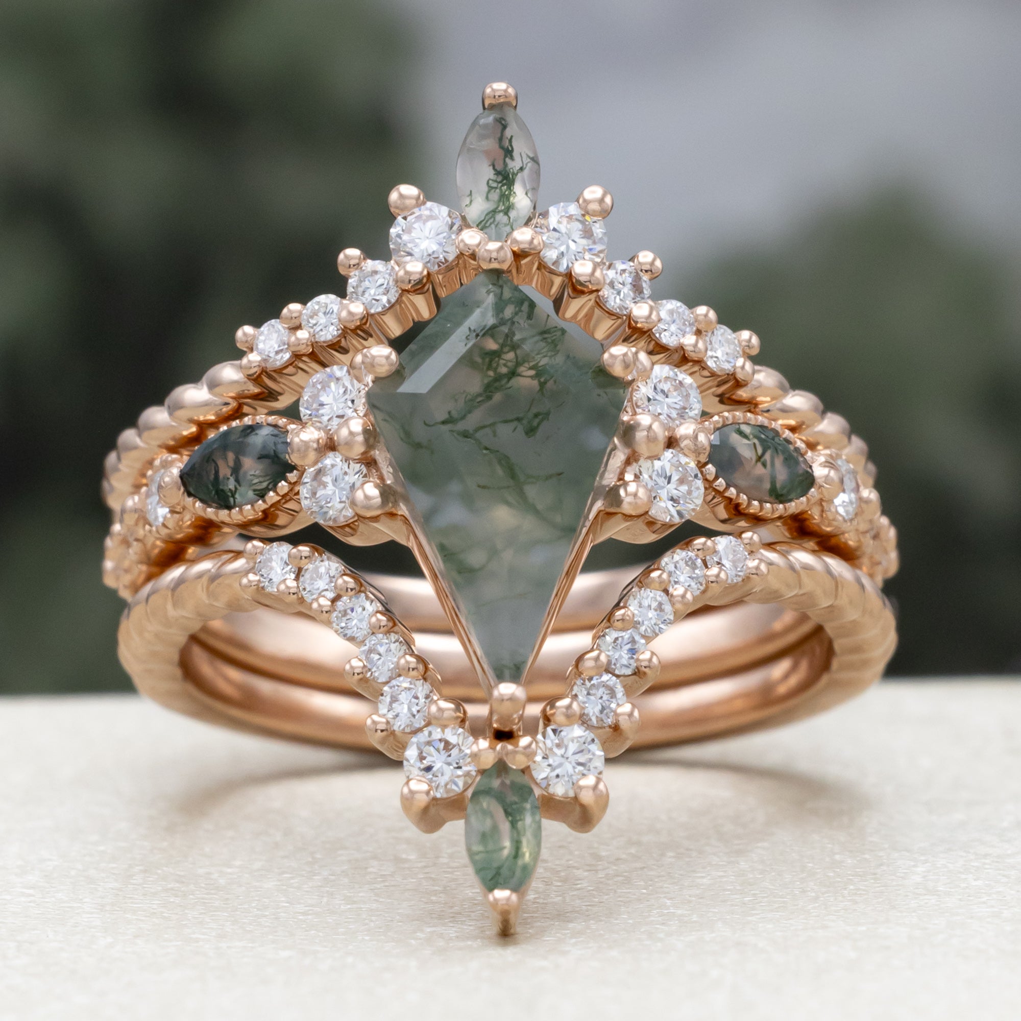 "Shimmering Sage" - Bridal Suite - Kite Cut Moss Agate Engagement Ring With Marquise Moss Agate Accents & A Diamond Tracer-Staghead Designs