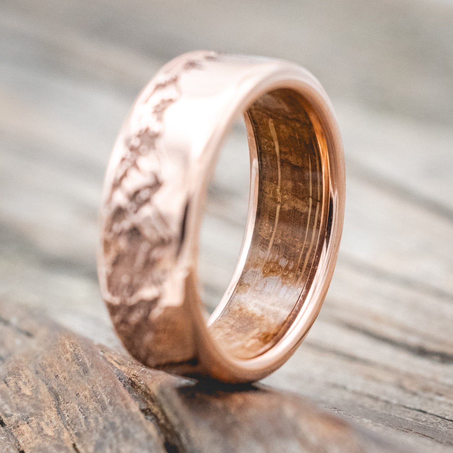 Whiskey barrel oak lined band featuring a continual mountain & forest engraving