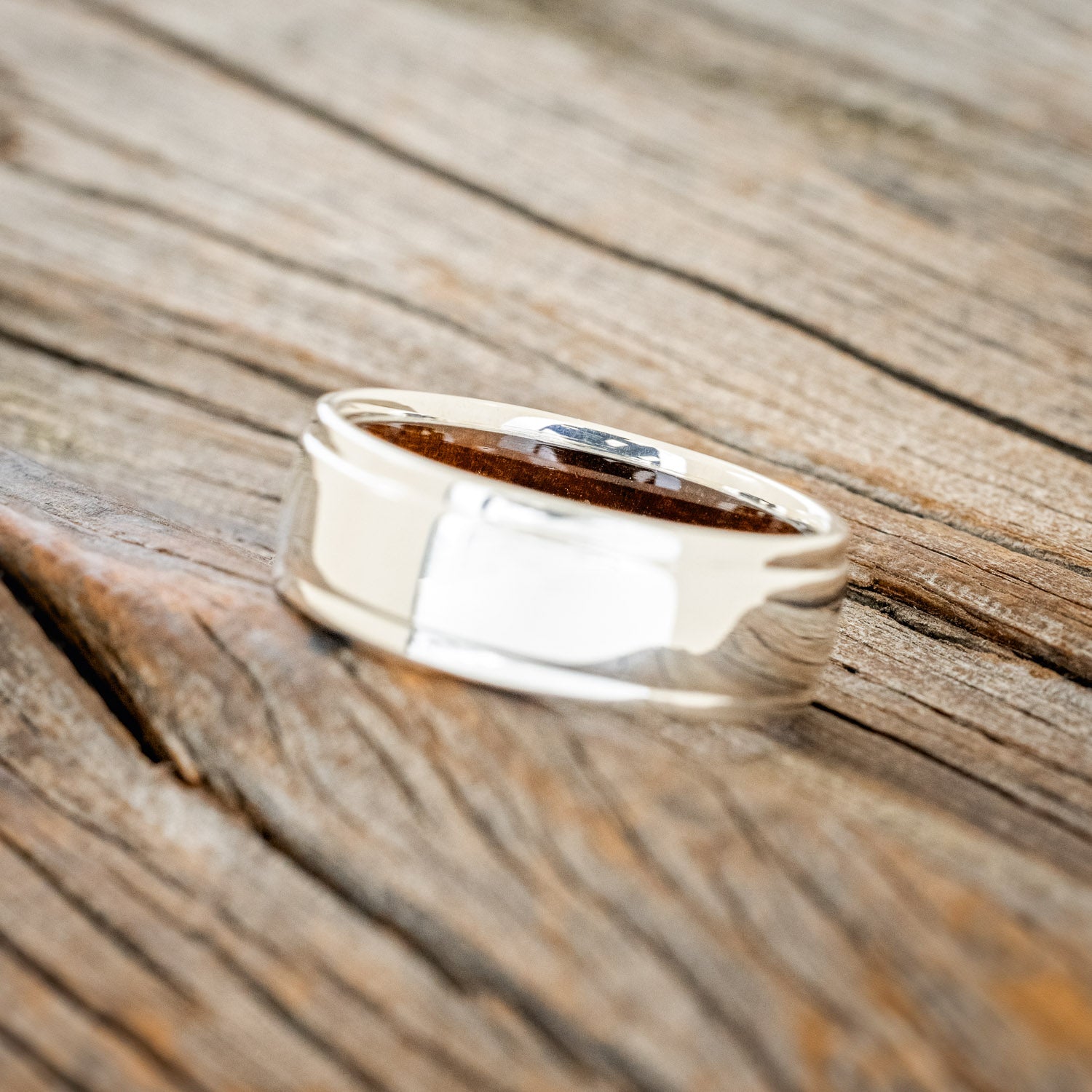 "SEDONA" - RAISED CENTER WEDDING RING WITH AN IRONWOOD LINED BAND-17