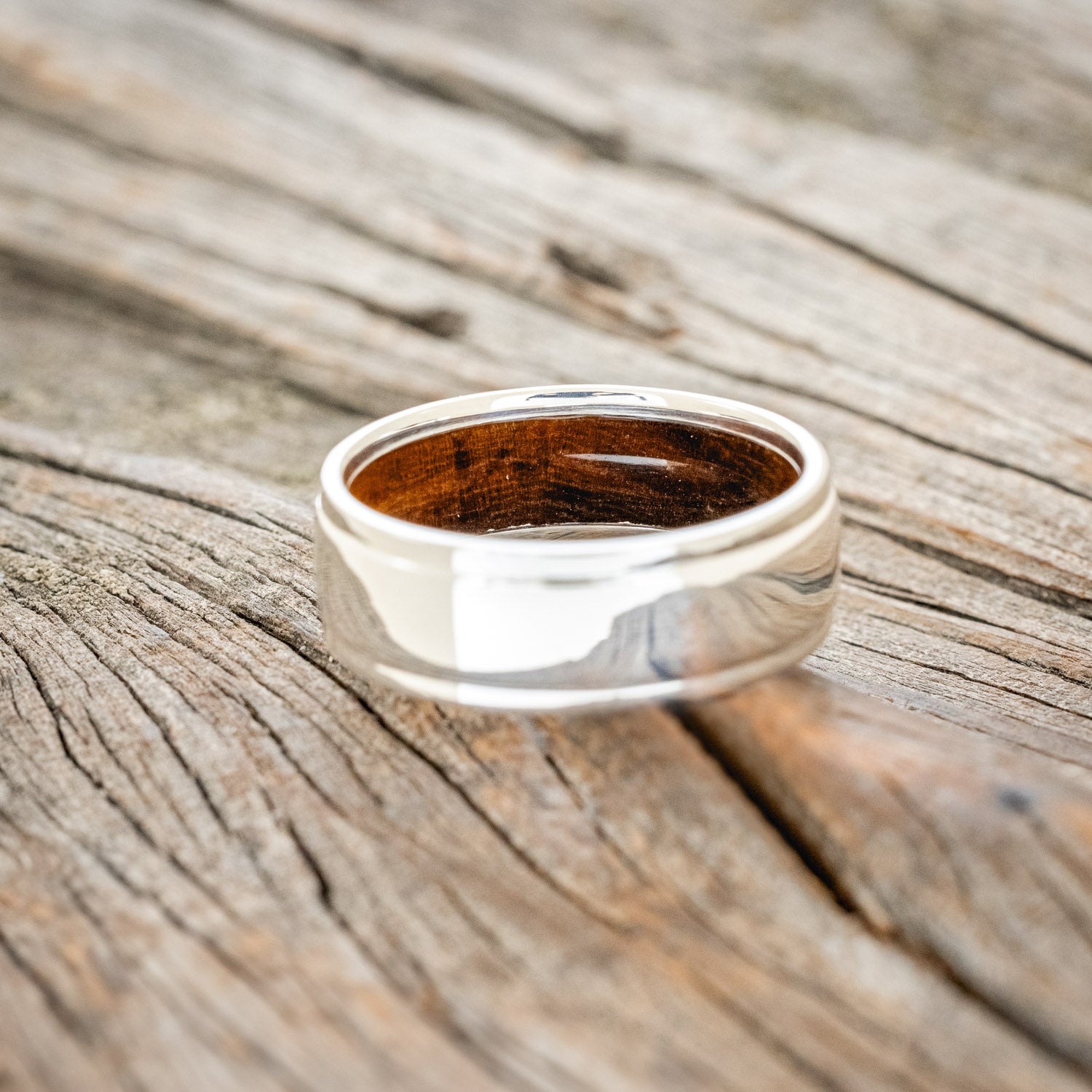 "SEDONA" - RAISED CENTER WEDDING RING WITH AN IRONWOOD LINED BAND-18