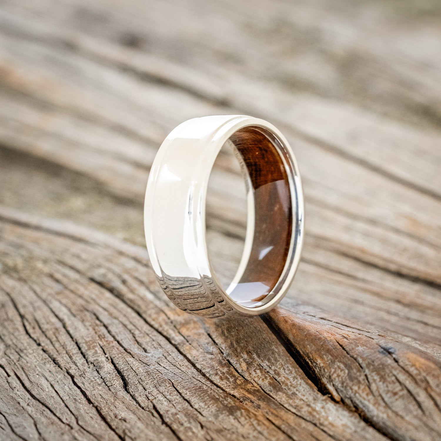 "SEDONA" - RAISED CENTER WEDDING RING WITH AN IRONWOOD LINED BAND-13