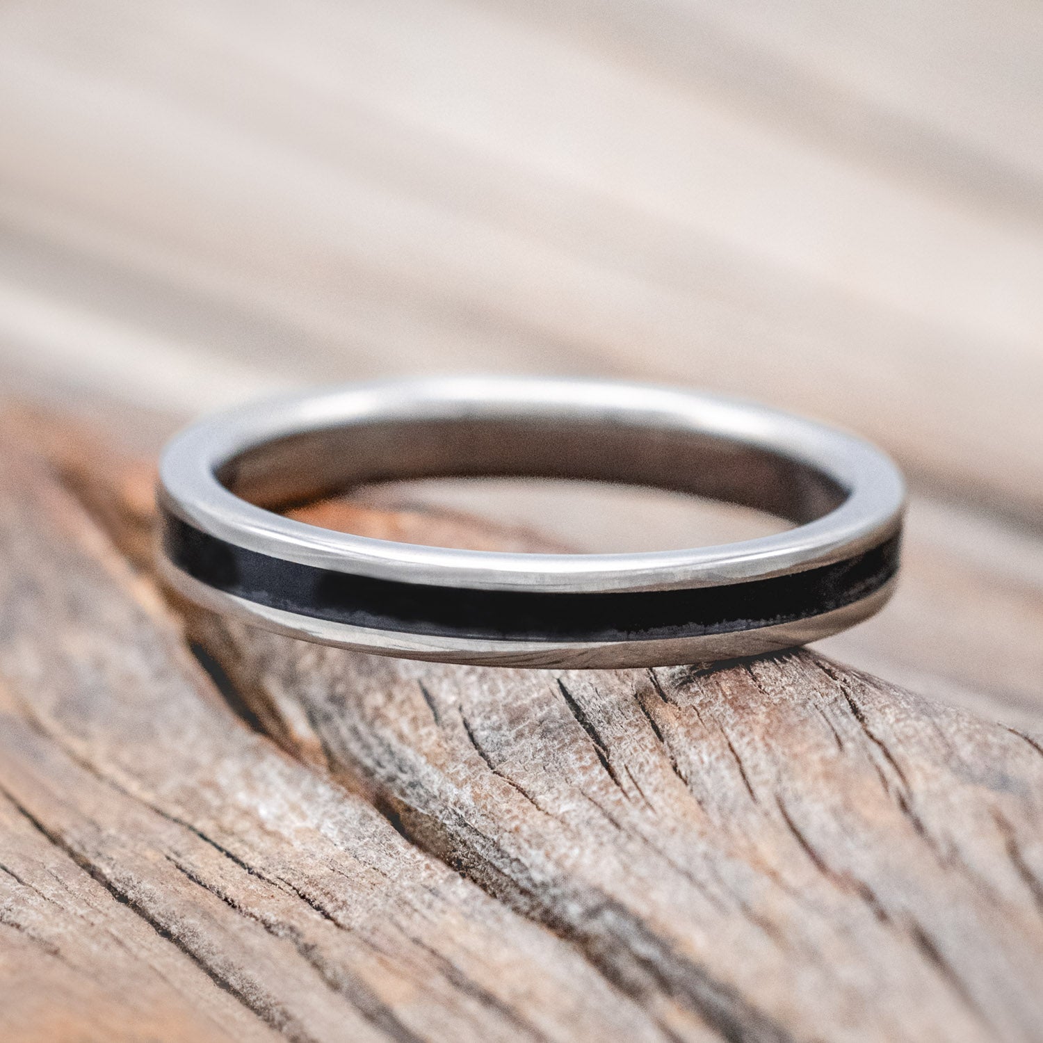 "Eterna" - women's stacking band featuring a jet stone inlay in titanium