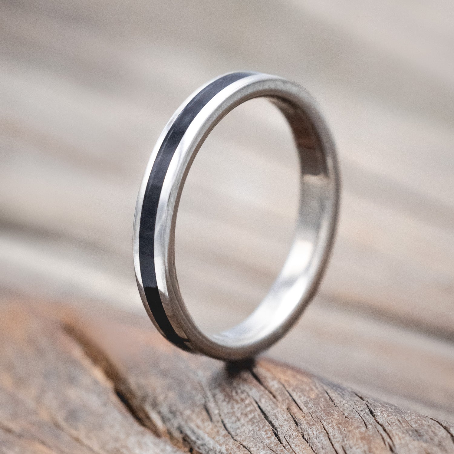 "Eterna" - women's stacking band featuring a jet stone inlay in titanium