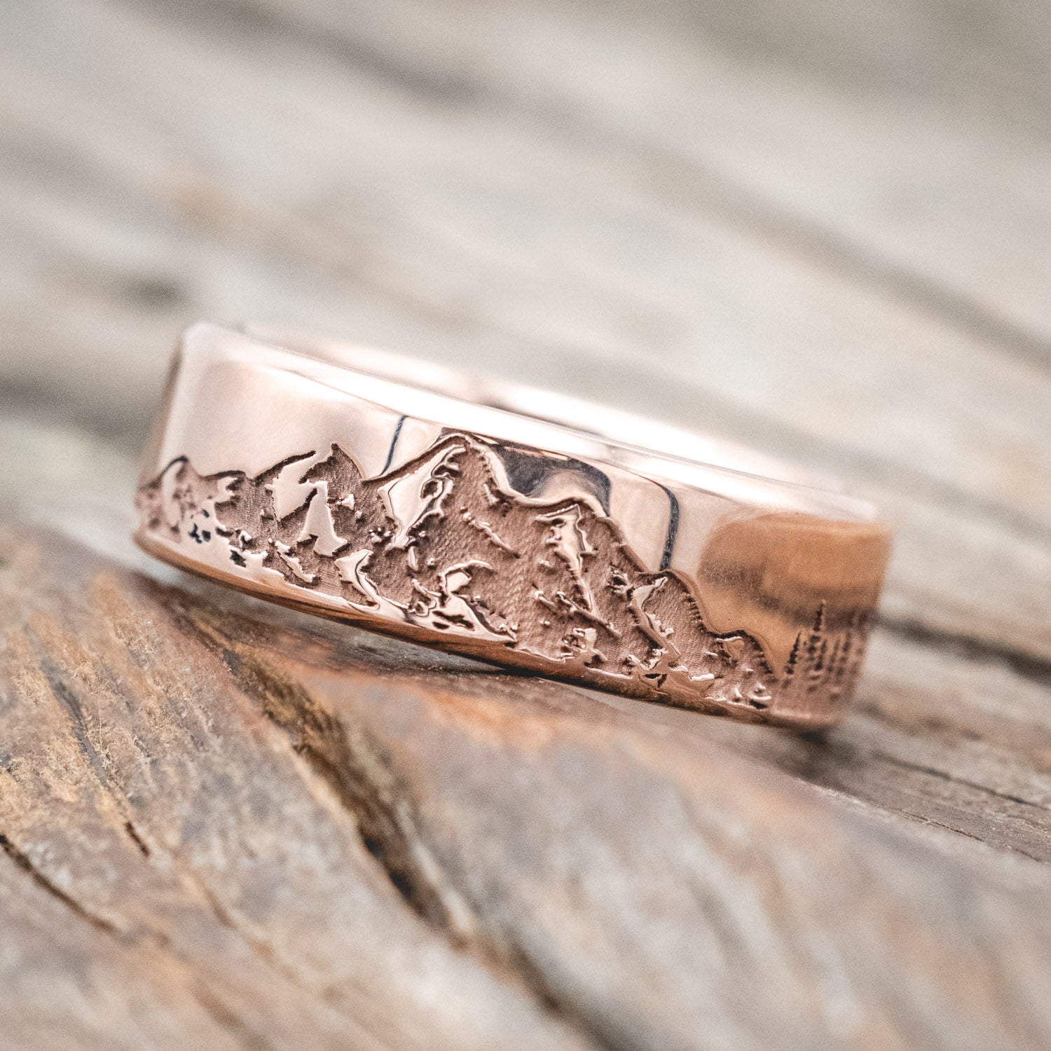 Whiskey barrel oak lined band featuring a continual mountain & forest engraving