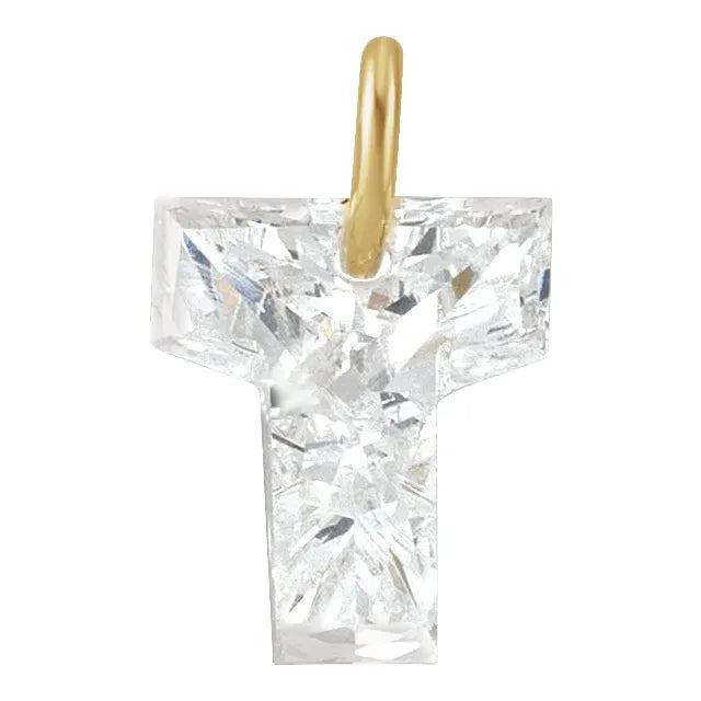 Diamond pendant shaped like the letter 'T' on a white background