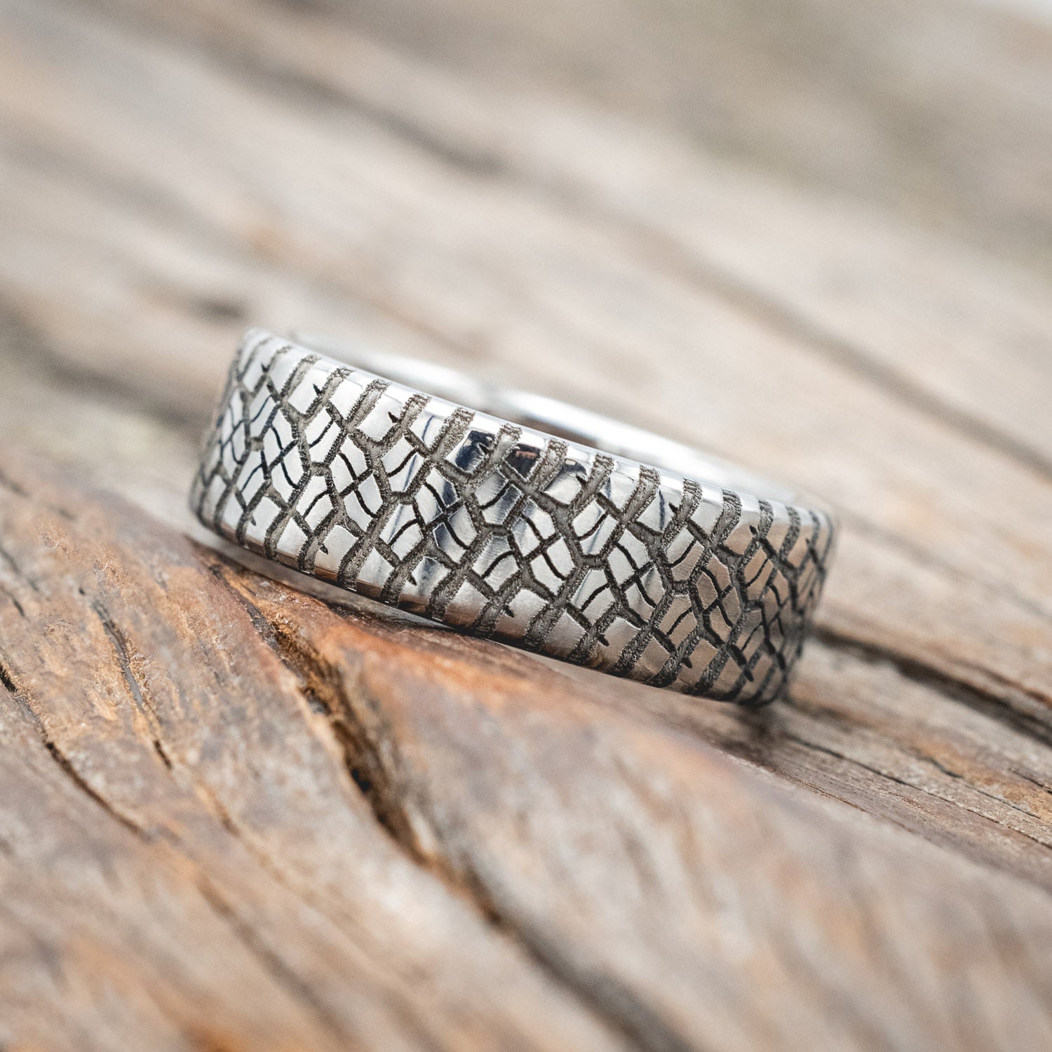 "PARCEL" - CUSTOM EMBOSSED TIRE TREAD WEDDING RING WITH A WHISKEY BARREL LINING-Staghead Designs